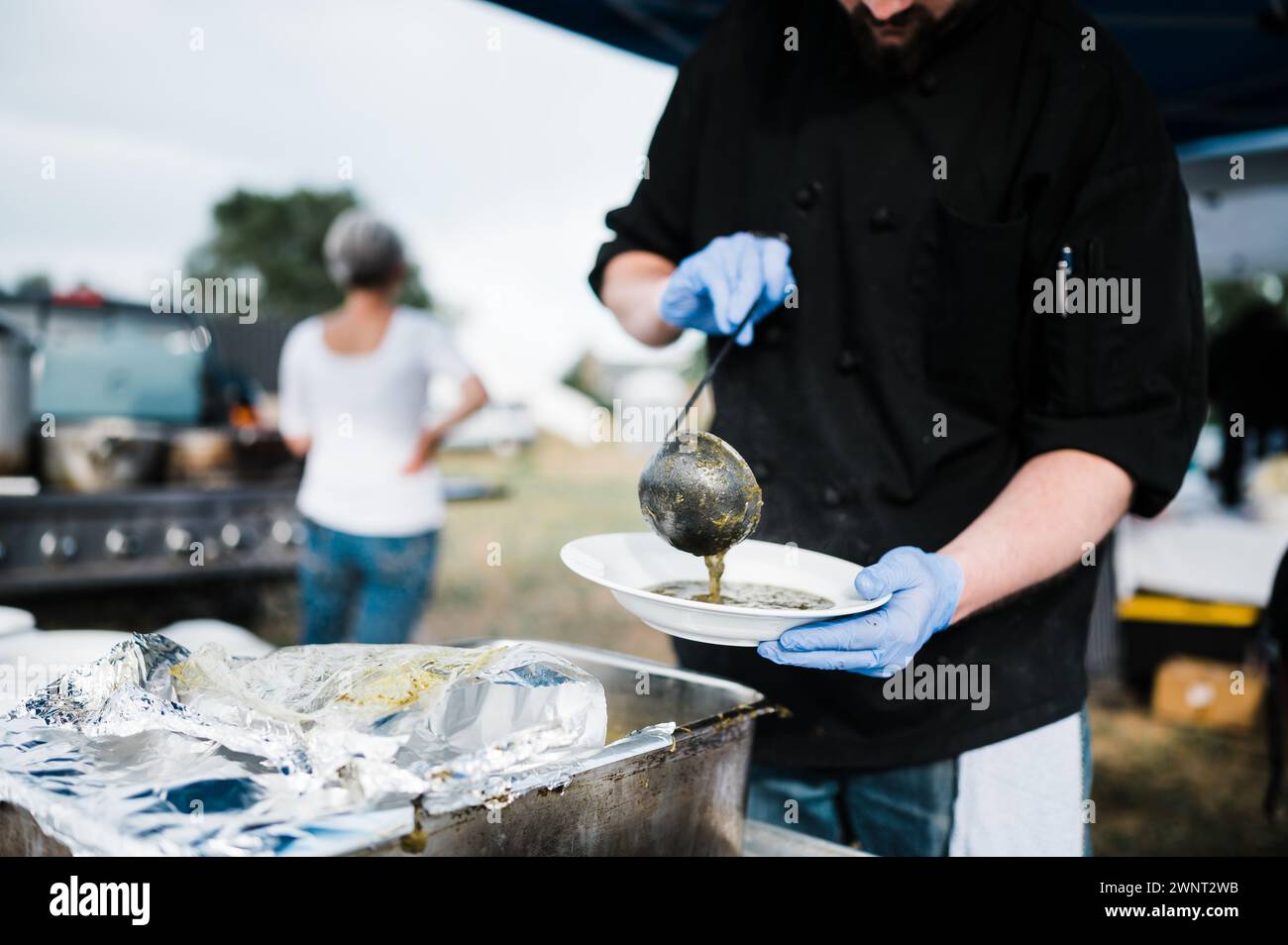 Chef plating food to be served Stock Photo - Alamy