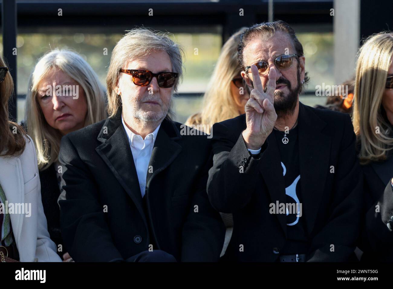Paul McCartney, left, and Ringo Starr attend the Stella McCartney Fall