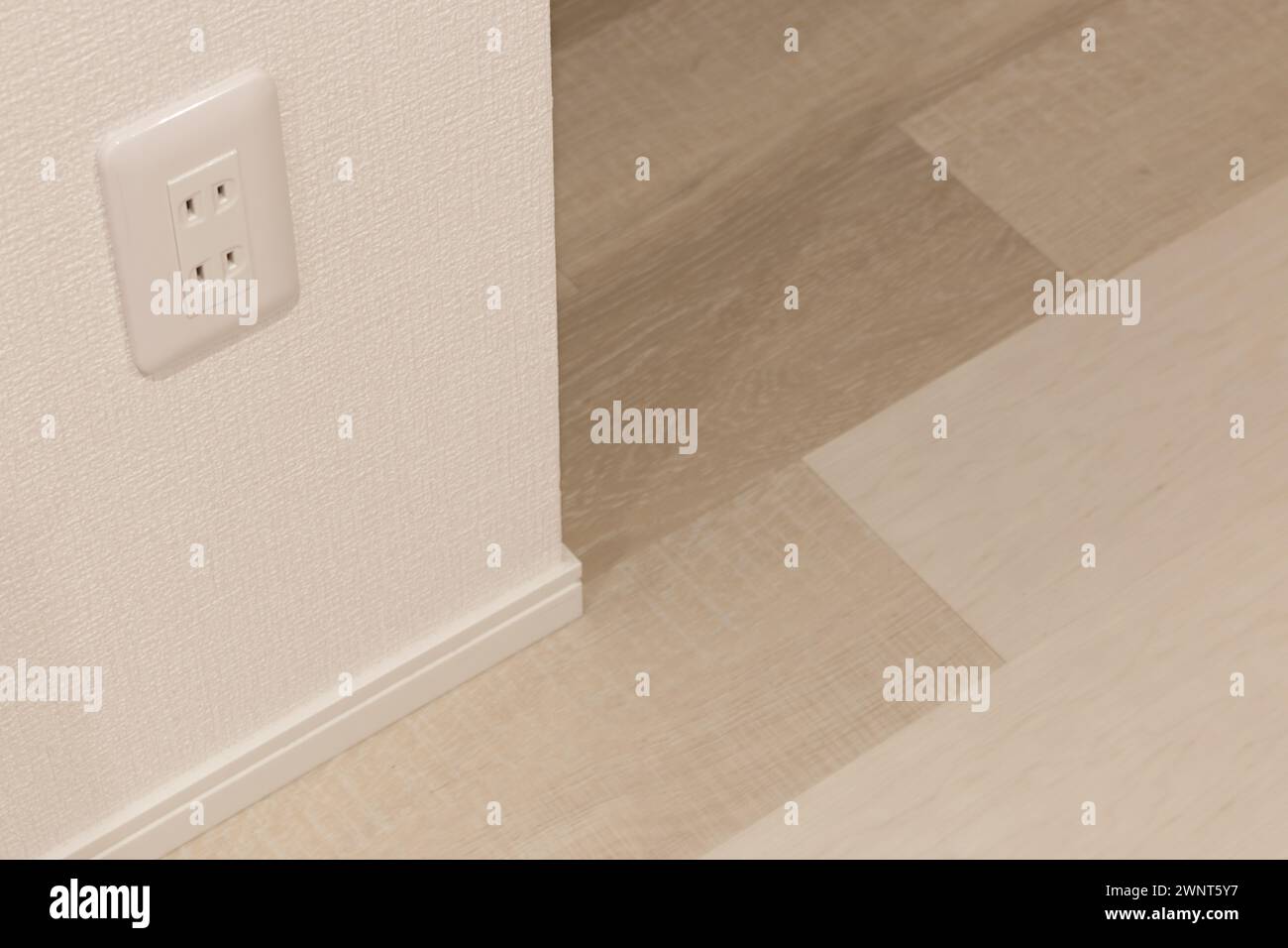Japanese style type-A two-pin electric plug socket in wall Stock Photo