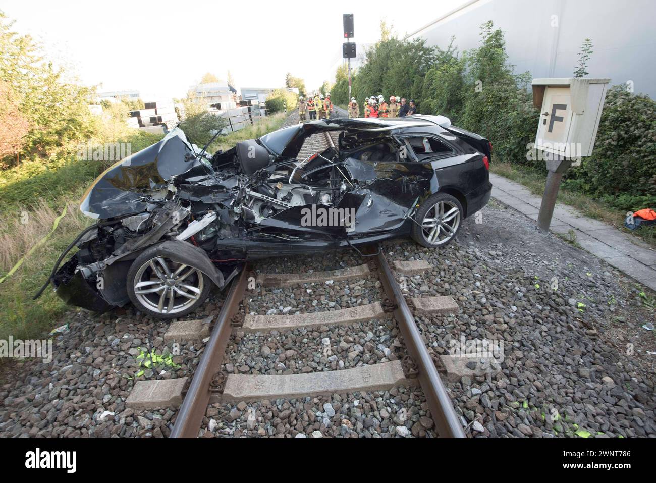 traffic accident after collision of a car with a train traffic