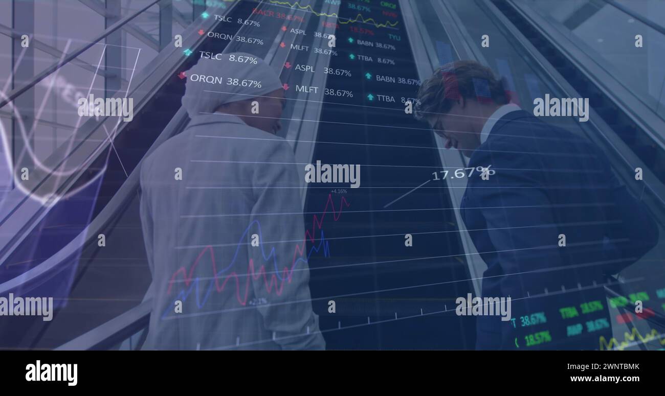 Image of financial data and graphs over back of diverse businesspeople ...
