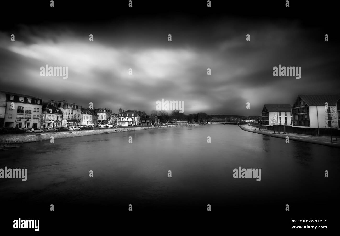 A view of the Aisne River in flood in Soissons, France, in black and white. Stock Photo