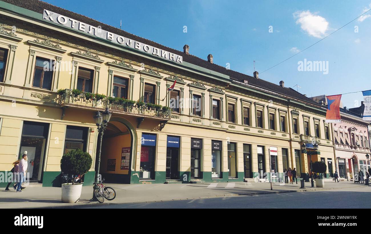 Novi Sad, Serbia 30 April 2022 Hotel Vojvodina is the oldest hotel in the center of the city. European tourism facility. Street with passers-by Stock Photo