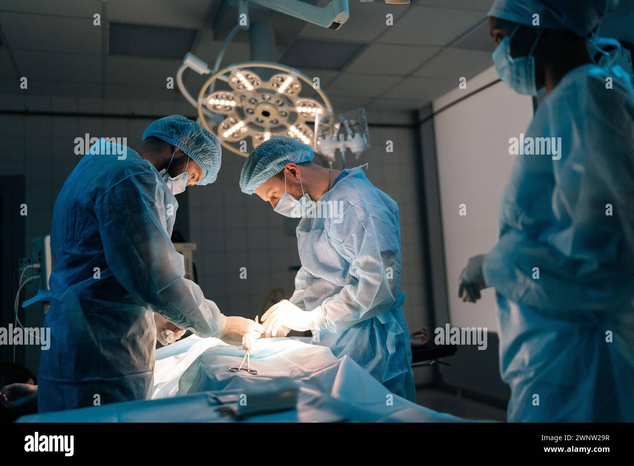 Multiethnic operation hi-res stock photography and images - Alamy