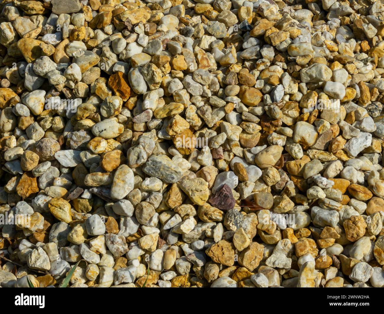 Yellow gravel stone, texture background Stock Photo
