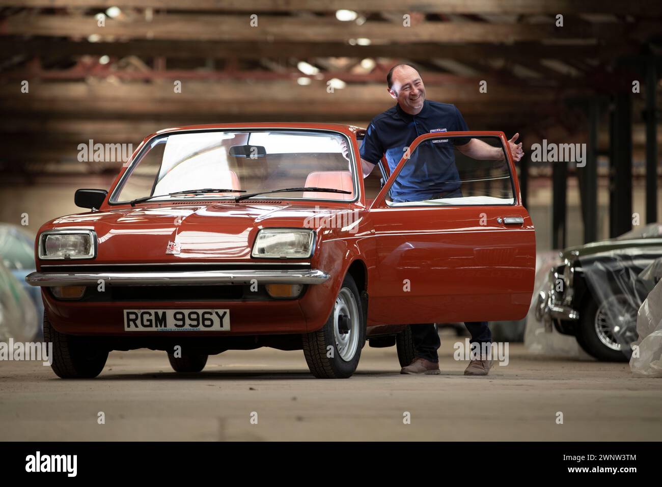 21/04/21  Jason Jones with the 1982 Vauxhall Chevette L.   A  collection of 130 British cars, in almost as many paint shades, was unveiled at Great Br Stock Photo