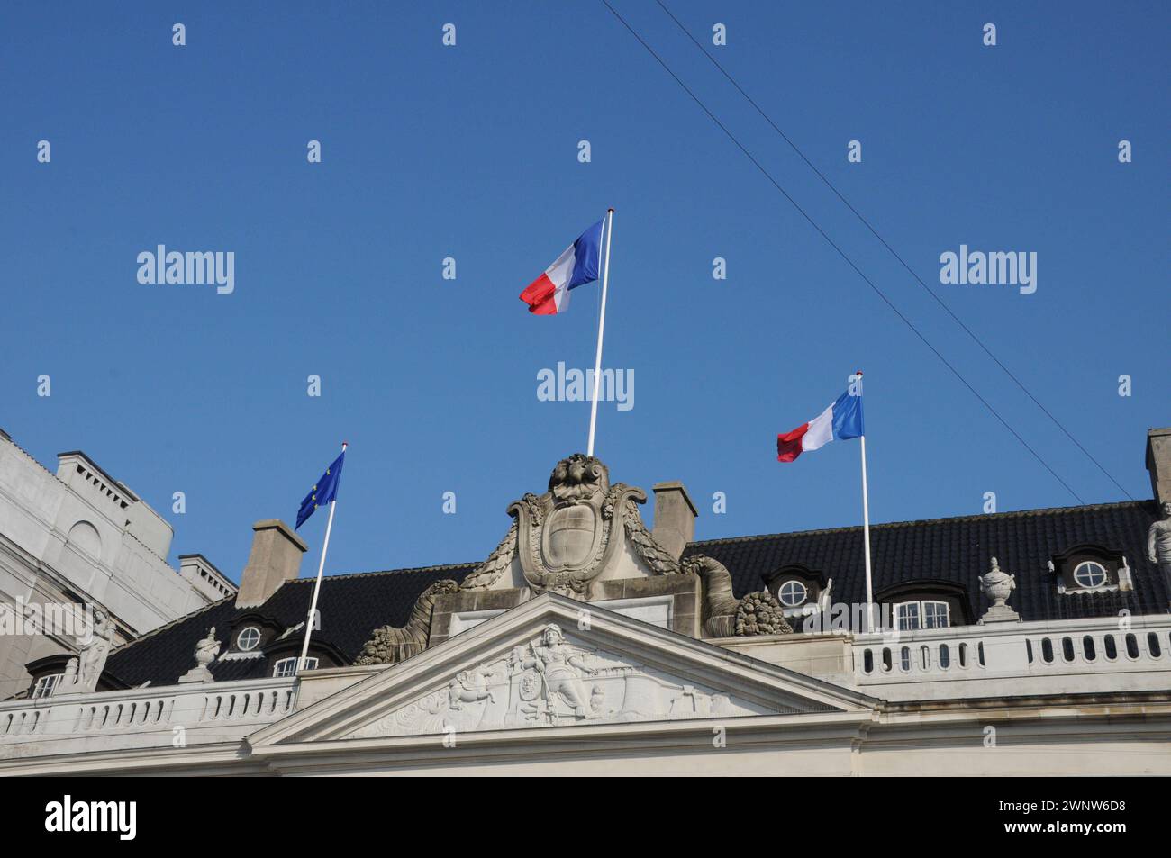 Copenhagen, Denmark /04 March 2024/.Ferenmch flag and eu flag fly over french embassy in danish capital Copenhagen location kongen nytorv square . Photo.Francis Joseph Dean/Dean Pictures Stock Photo