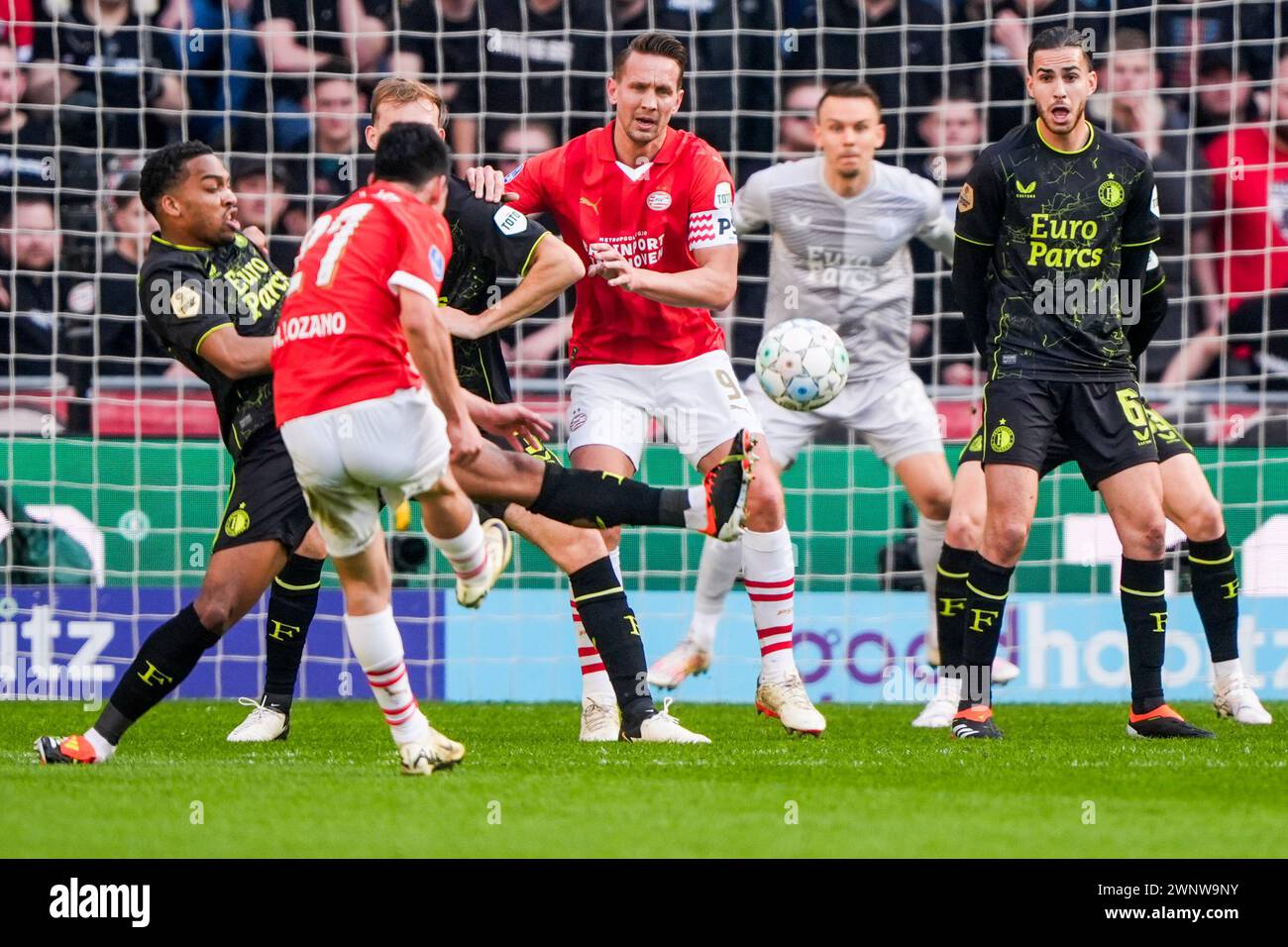 Eindhoven, The Netherlands. 03rd Mar, 2024. Eindhoven - Luuk de jong of PSV, Ramiz Zerrouki of Feyenoord during the Eredivisie match between PSV v Feyenoord at Philips Stadion on 3 March 2024 in Eindhoven, The Netherlands. Credit: box to box pictures/Alamy Live News Stock Photo