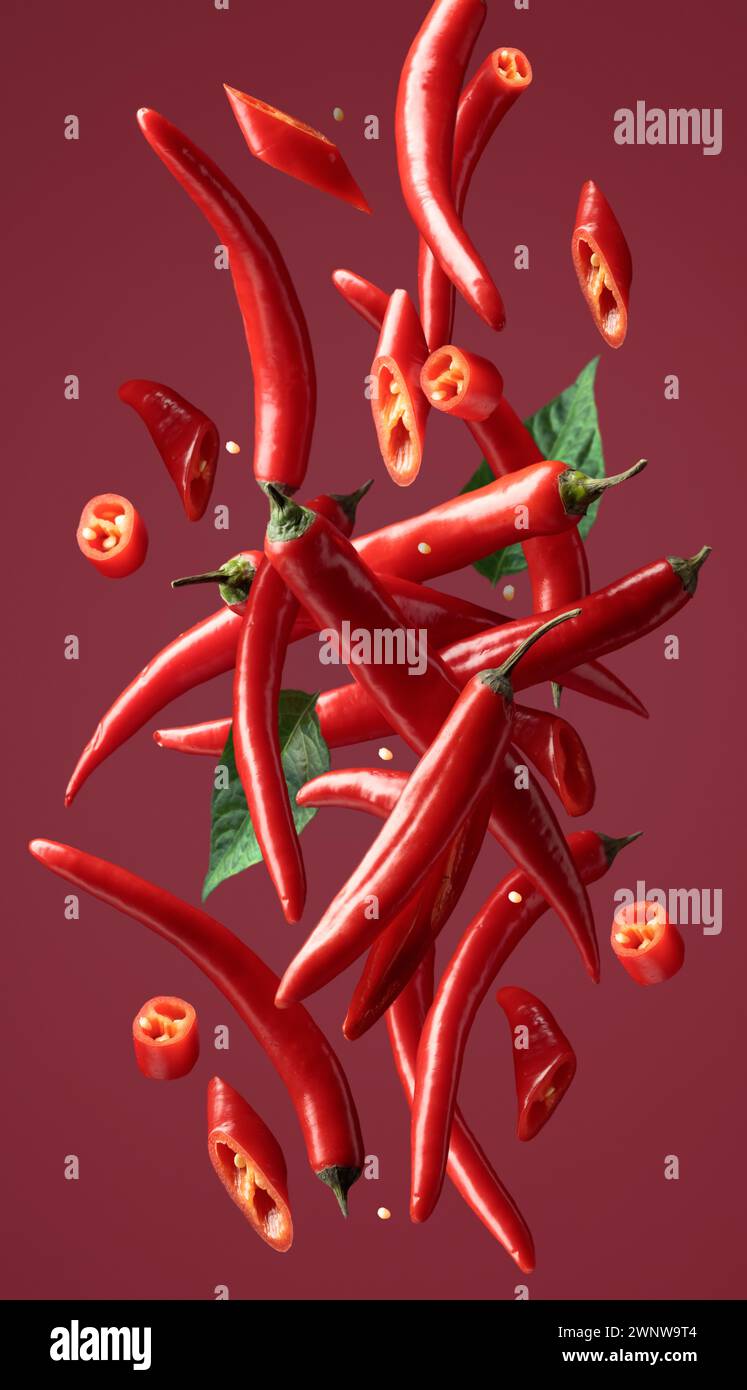 Fresh red green peppers falling hi-res stock photography and images - Alamy