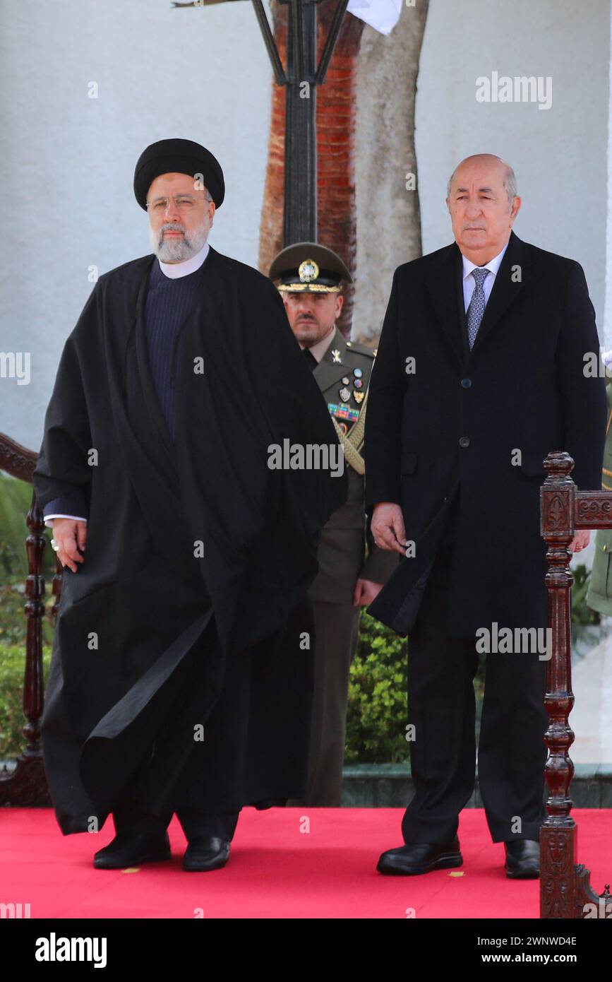 Algiers, Algeria. 4th Mar, 2024. Algerian President ABDELMADJID TEBBOUNE (R) welcomes the Iranian President EBRAHIM RAISI (L) with a welcoming ceremony at the El Mouradia Palace during the 7th Summit of Heads of State and Government of the Gas Exporting Countries Forum in Algiers, Algeria. (Credit Image: © Iranian Presidency via ZUMA Press Wire) EDITORIAL USAGE ONLY! Not for Commercial USAGE! Stock Photo