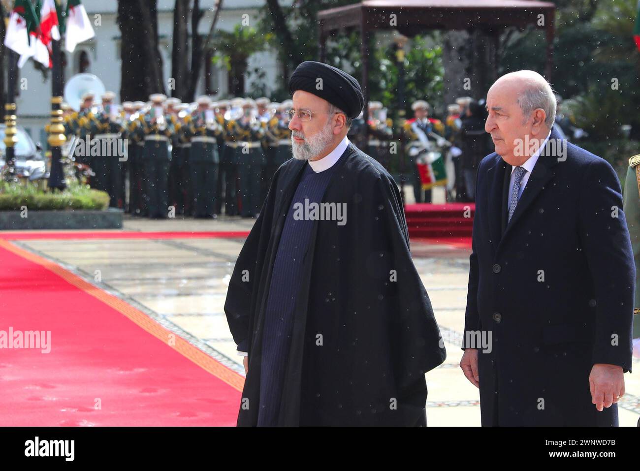 Algiers, Algeria. 4th Mar, 2024. Algerian President ABDELMADJID TEBBOUNE (R) welcomes the Iranian President EBRAHIM RAISI (L) with a welcoming ceremony at the El Mouradia Palace during the 7th Summit of Heads of State and Government of the Gas Exporting Countries Forum in Algiers, Algeria. (Credit Image: © Iranian Presidency via ZUMA Press Wire) EDITORIAL USAGE ONLY! Not for Commercial USAGE! Stock Photo