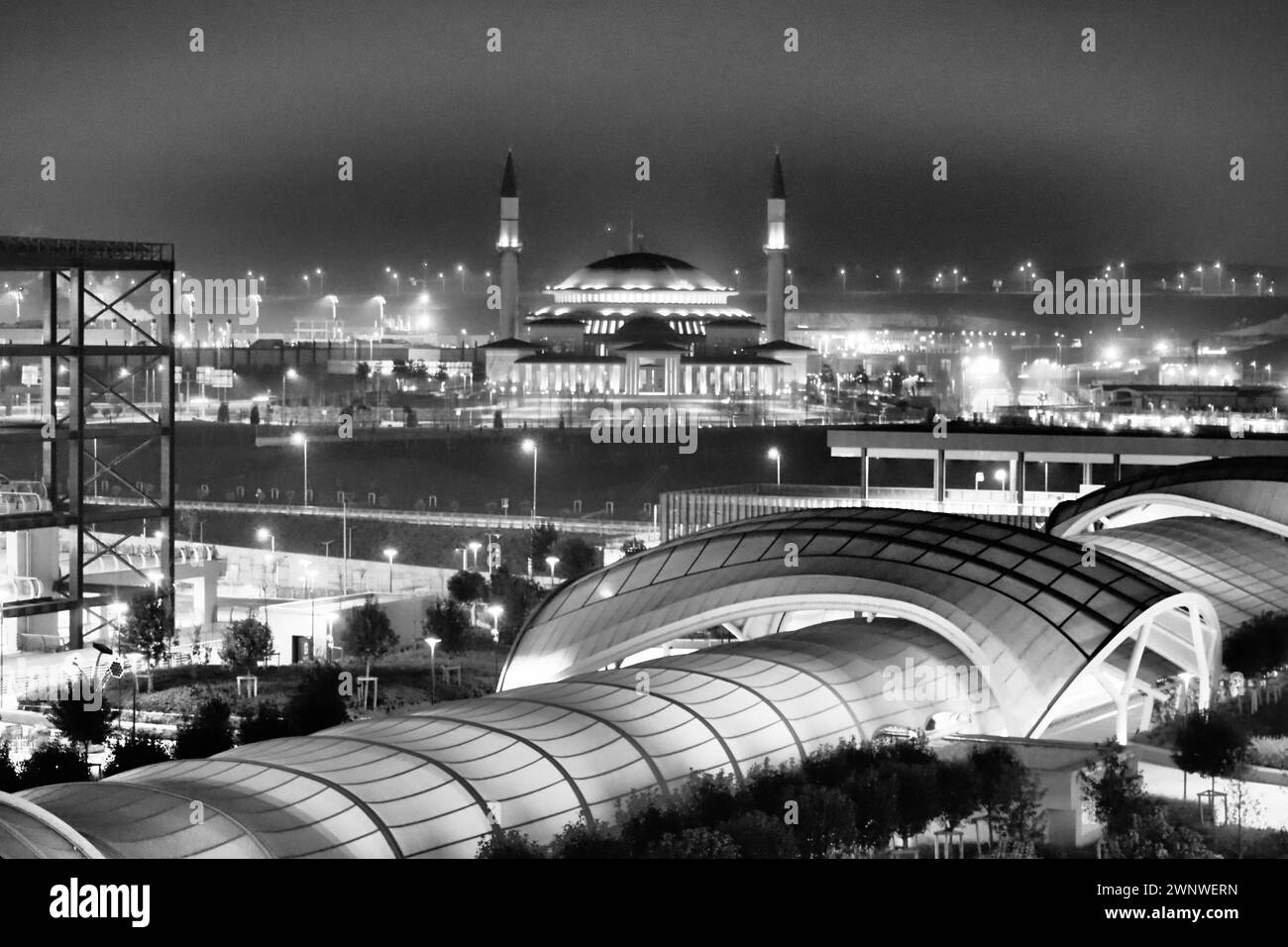 Istanbul, Turkiye 01.01.24: Ali Kuscu Mosque, first structure of Airport City. Night Istanbul, view from IST airport. The large beautiful mosque is Stock Photo