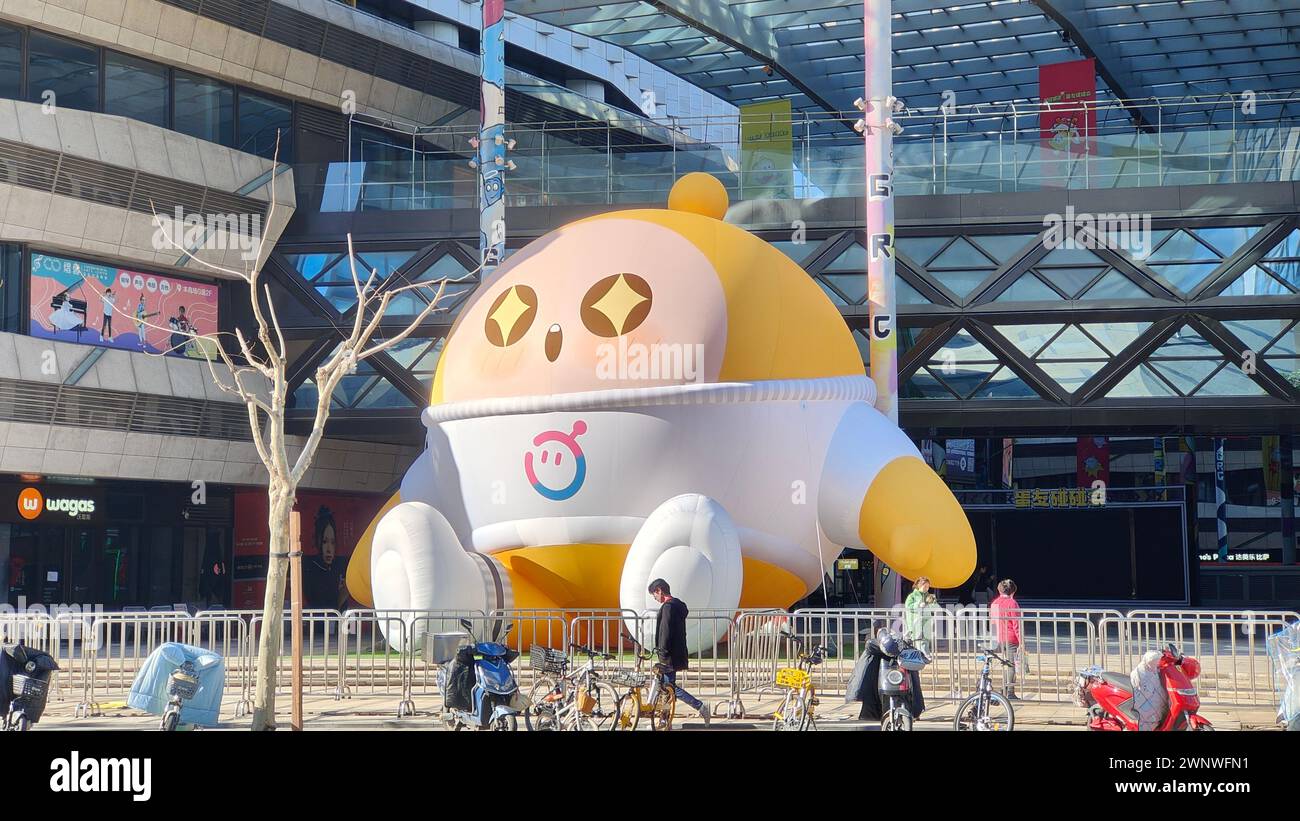 Chongqing, China. 04th Mar, 2024. A giant inflatable doll from the mobile game ''Egg Party'' is on display at the Xuhui Binjiang Shopping Mall in Shanghai, China, on February 16, 2024. (Photo by Costfoto/NurPhoto) Credit: NurPhoto SRL/Alamy Live News Stock Photo