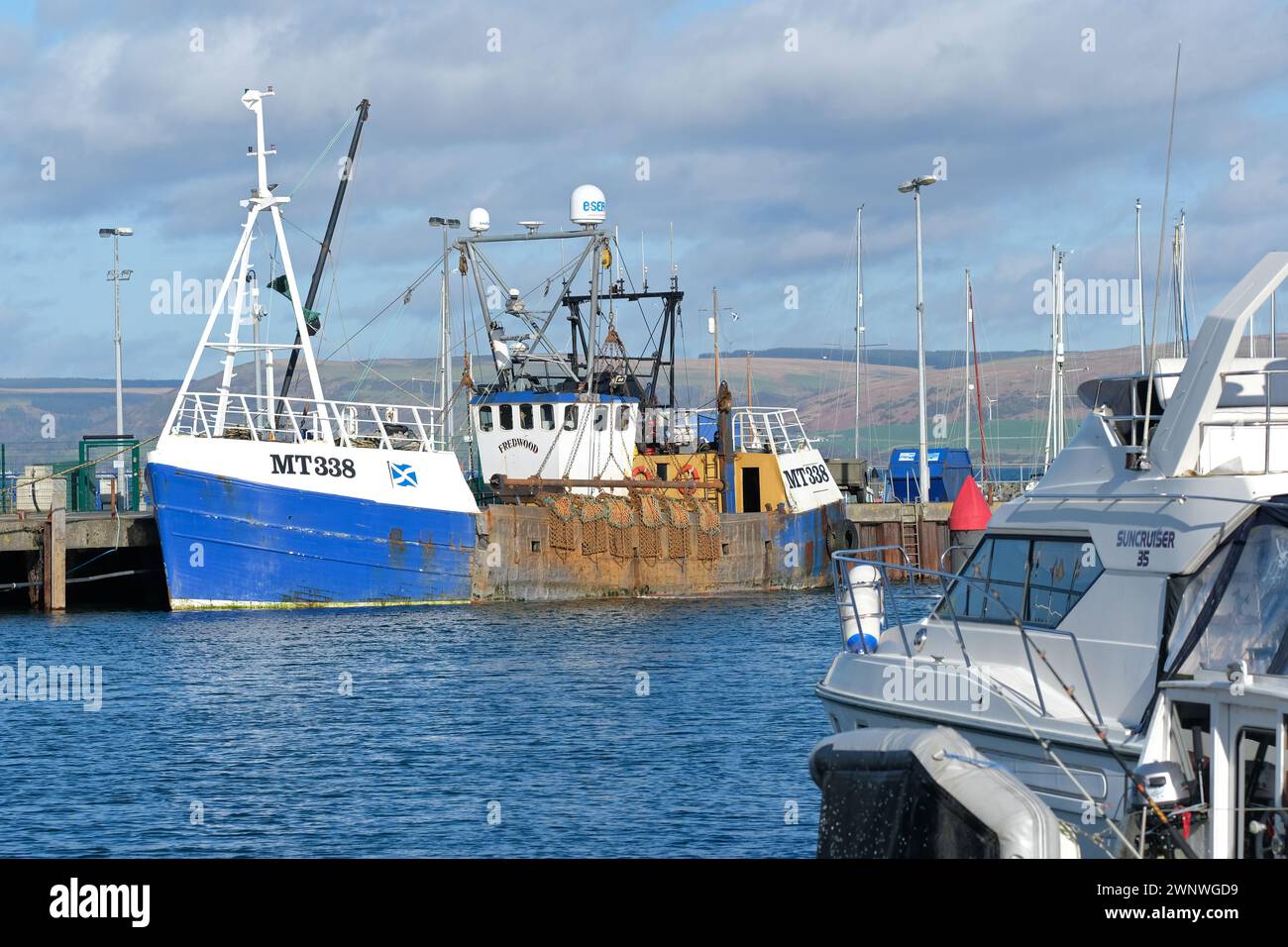 Stranraer Scotland UK - fishing vessel trawler MT338 named Fredwood in the harbour used for shellfish trawling Stock Photo