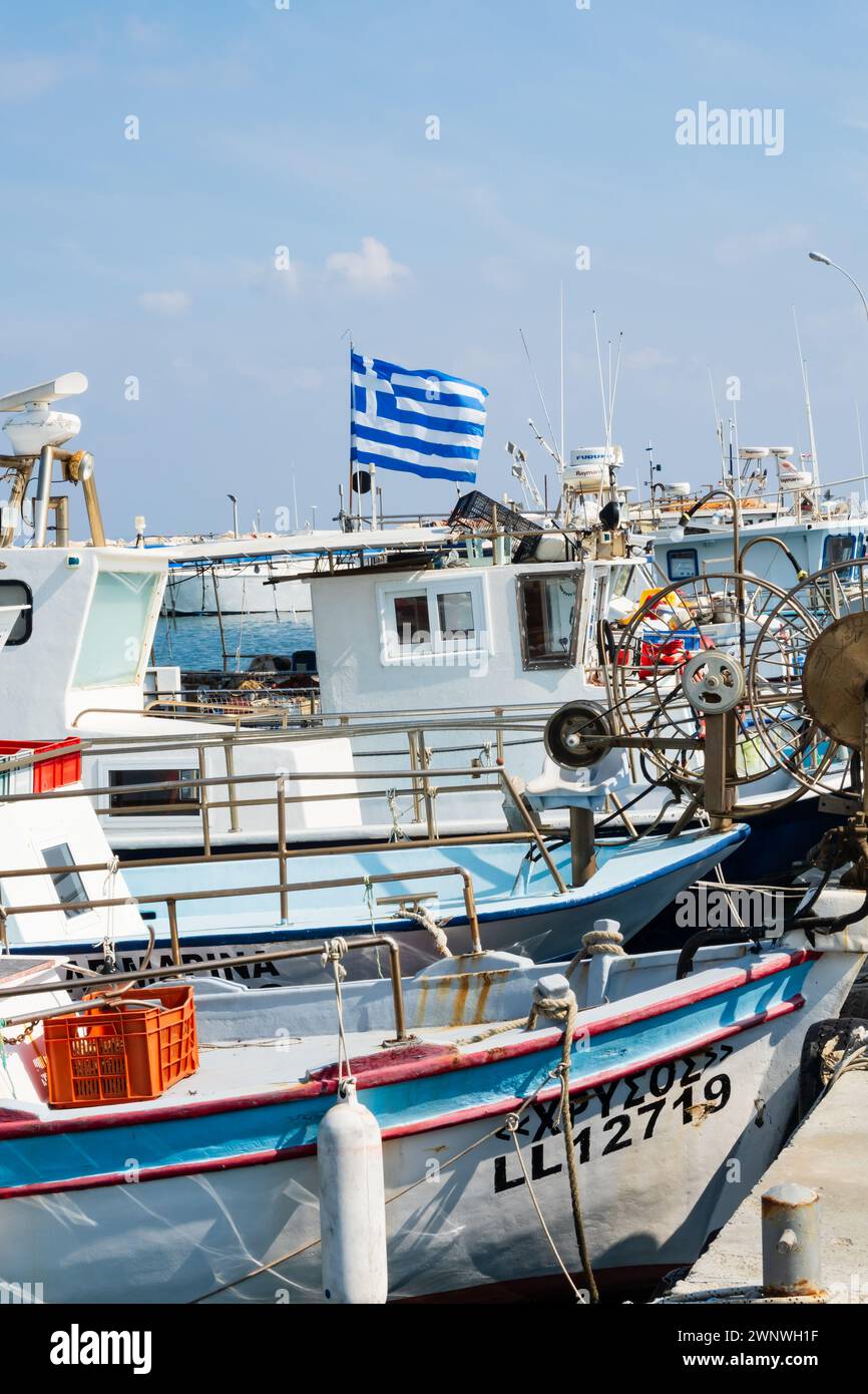 Traditional Cypriot small fishing boats moored in the fishing harbour, Larnaca, Cyprus. Feb 2024 Stock Photo