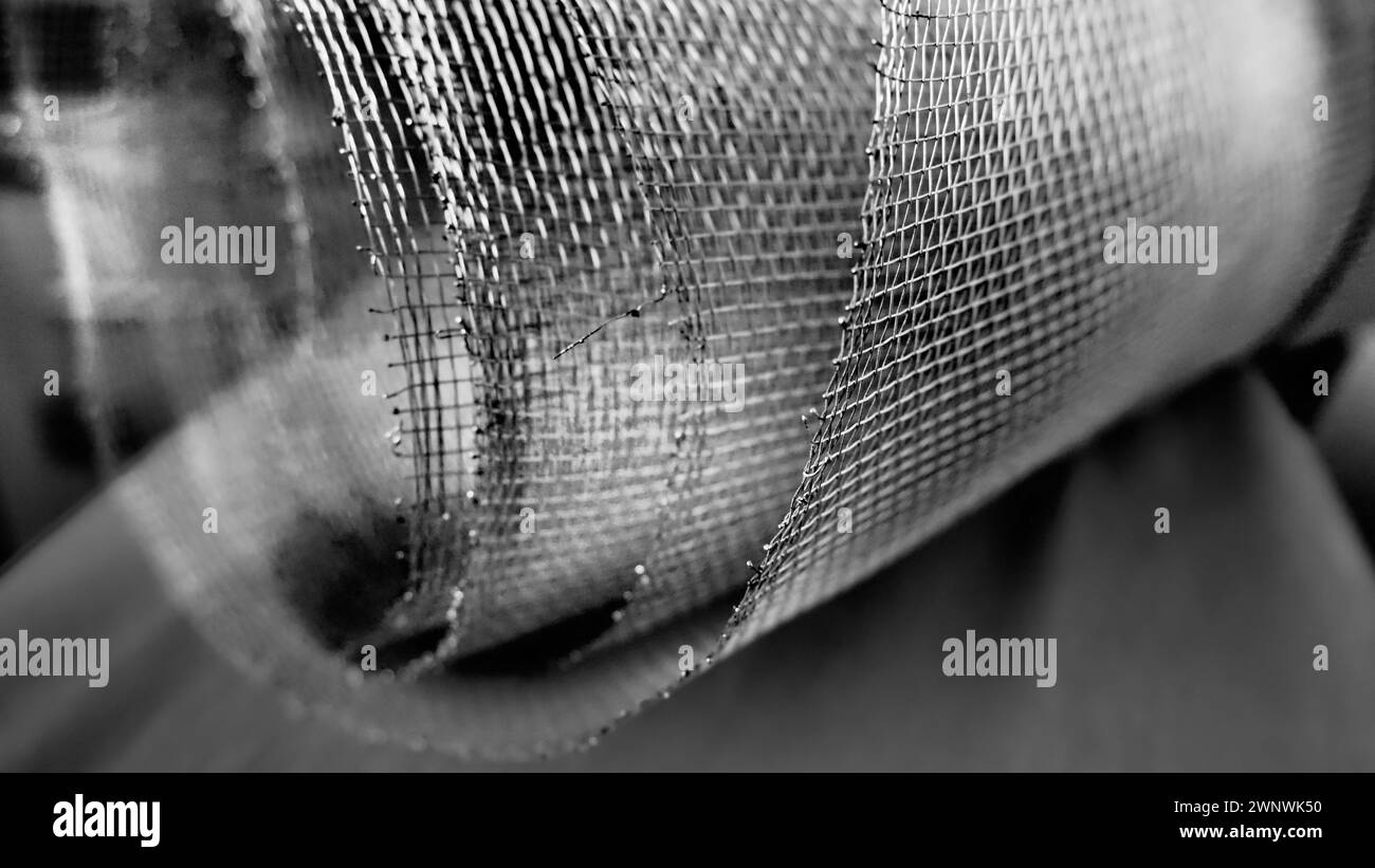 Metal mesh. Rolled mesh in gray. Heavy duty steel or aluminum mesh with