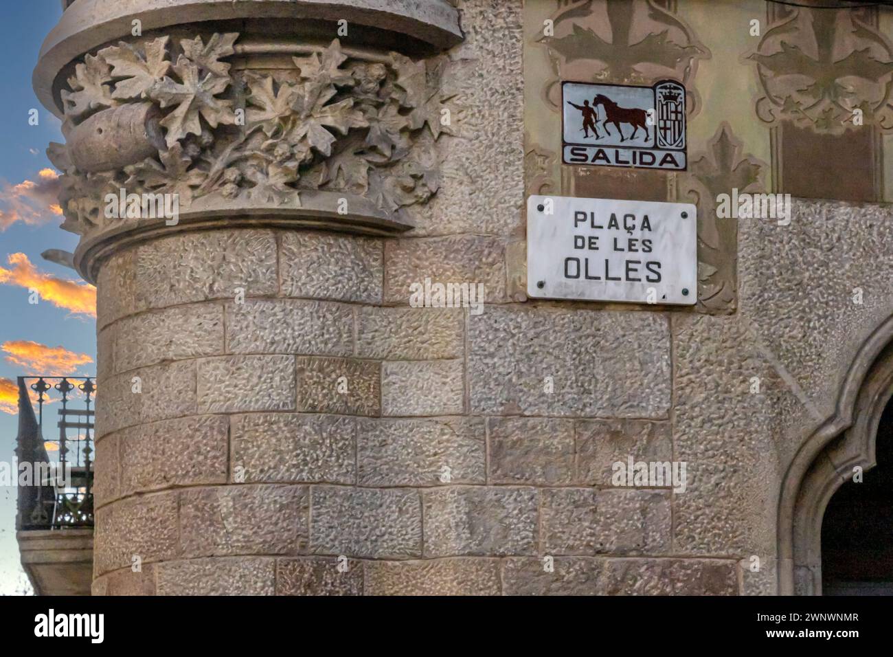 Old building background with specific spanish inscription for Square de les Olles in Barcelona, Catalonia, Spain. Stock Photo