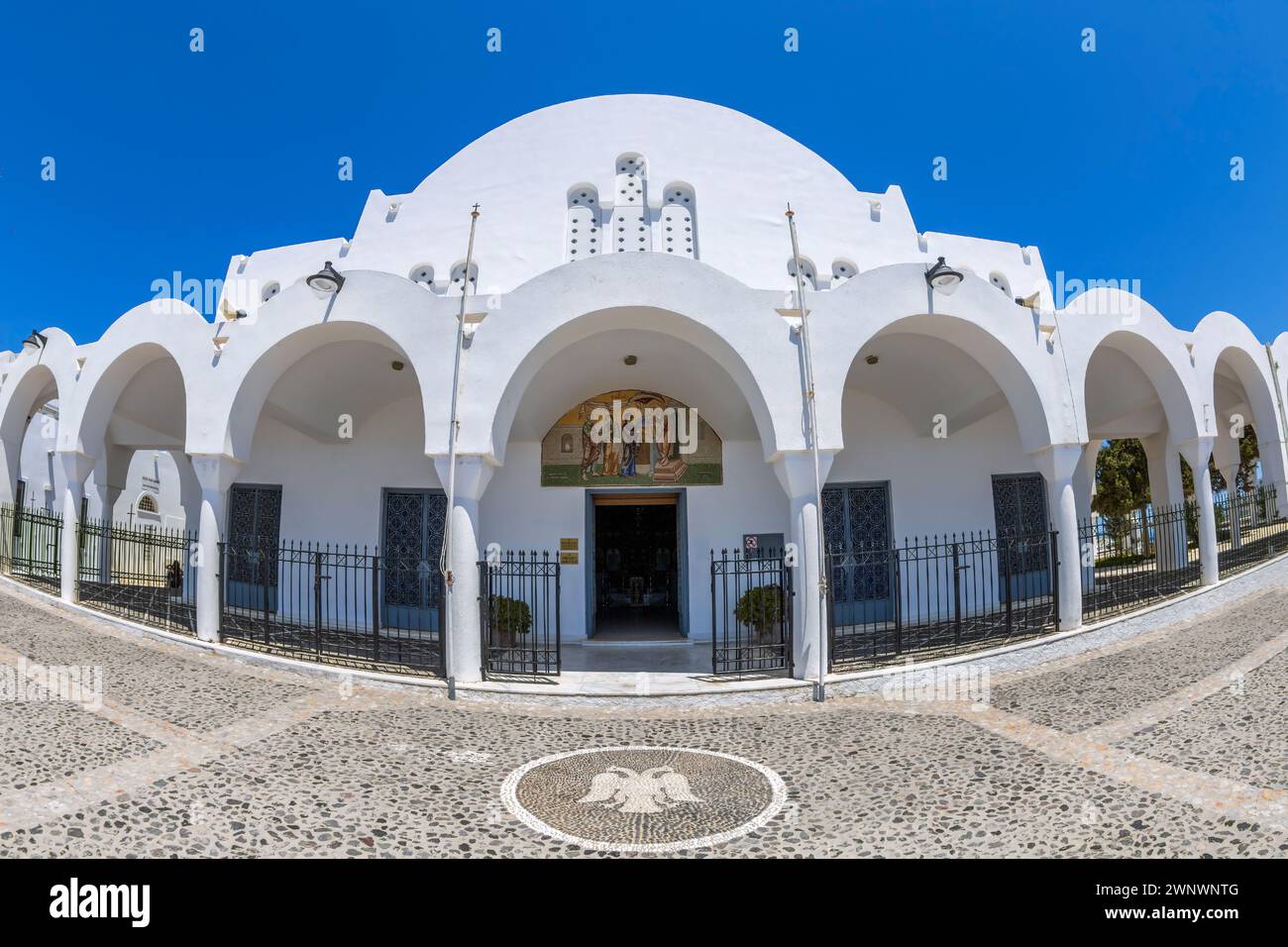 FIRA, SANTORINI, GREECE-JUNE 21,2021:The Orthodox Metropolitan Church of Candlemas of the Lord, Cyclades. Was built in 1827 and damaged in 1956 during Stock Photo