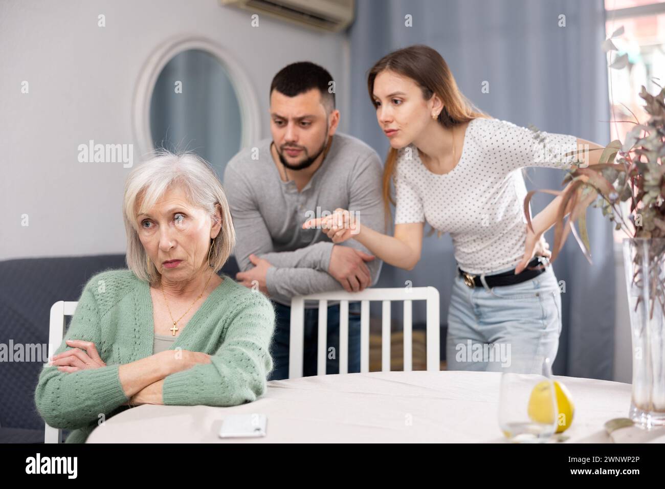 Three man woman conflict senior hi-res stock photography and images - Alamy