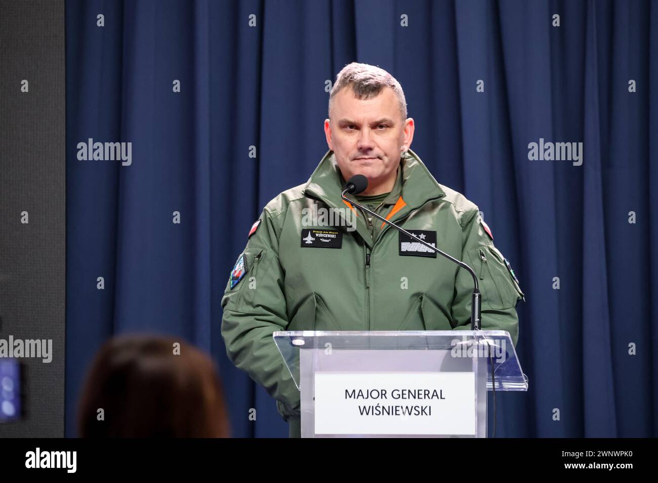 Korzeniewo, Poland on March 4, 2024. Major General Wisniewski speaks during a press conference during NATO's Dragon-24 exercise, a part of large scale Steadfast Defender-24 exercise. The Steadfast Defender-2 exercises, which will take place mainly in Central Europe, will involve some 90,000 troops from all NATO countries as well as Sweden. Their aim is to deter and present defend abilities in the face of aggression. Stock Photo