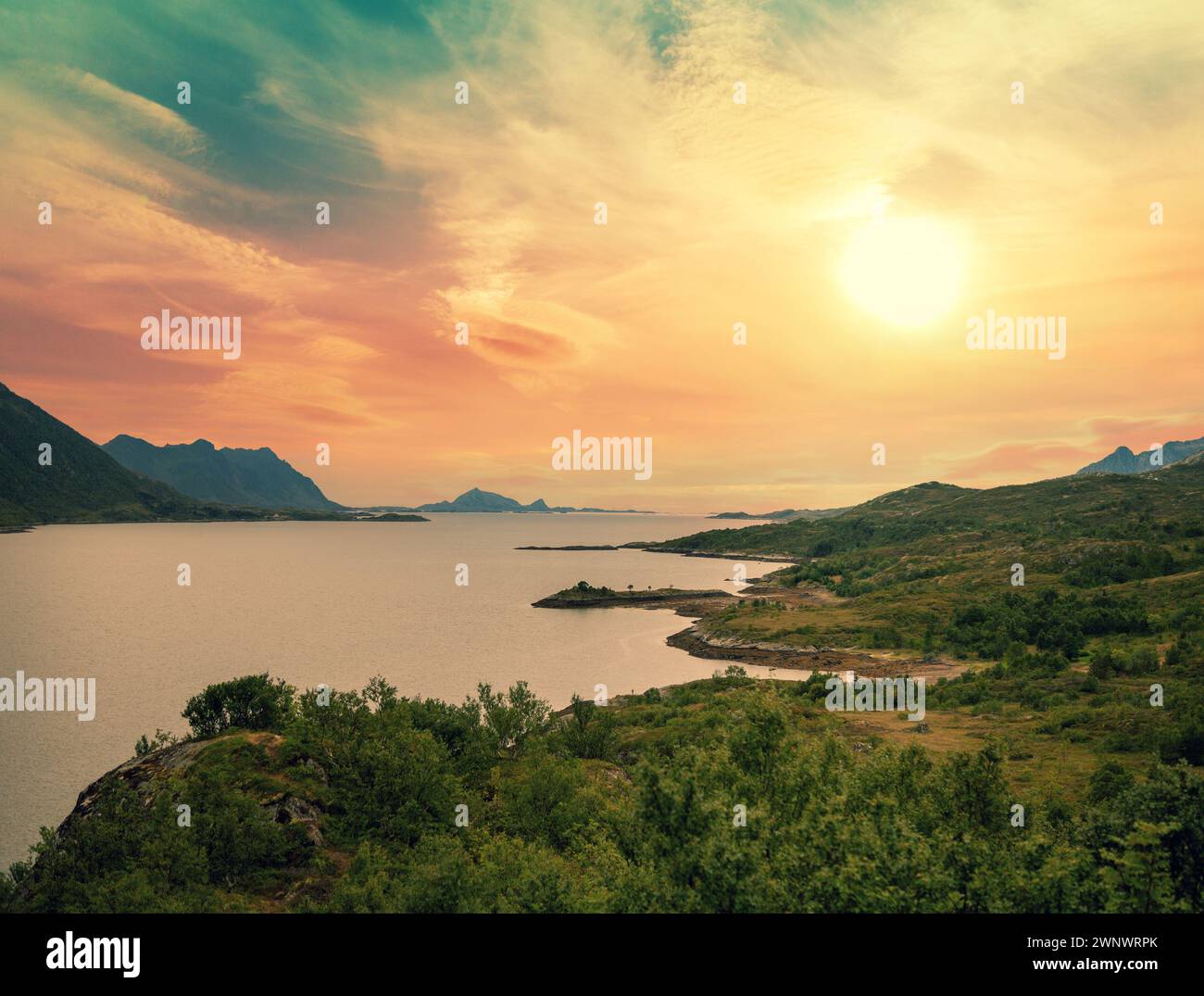 Mountain coast in the evening. View of the fjord during sunset. The ...