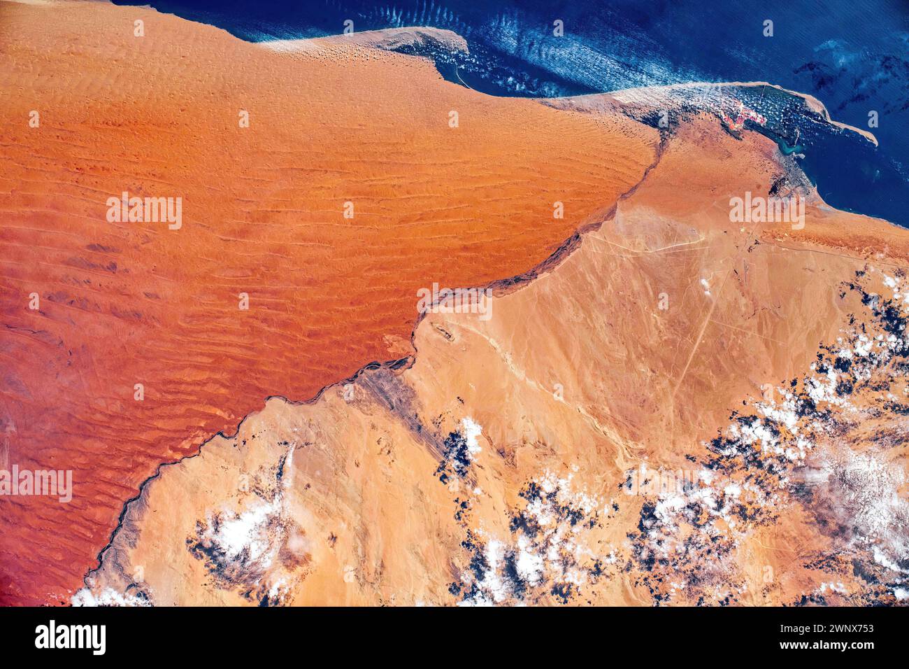 Desert coastline, Namibia. Digital enhancement of an image by NASA Stock Photo