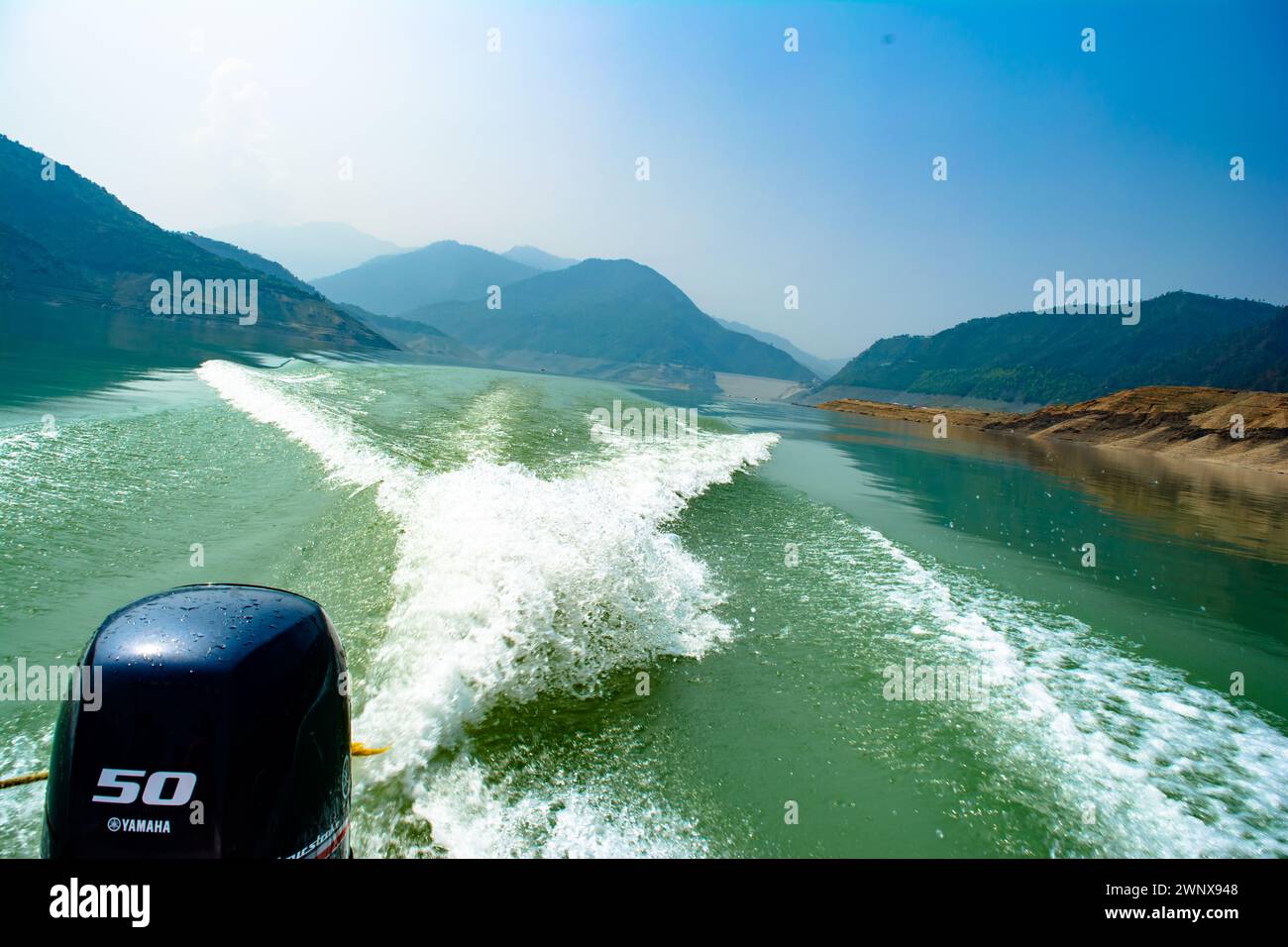 Water trail behind moving motor boat hi-res stock photography and ...