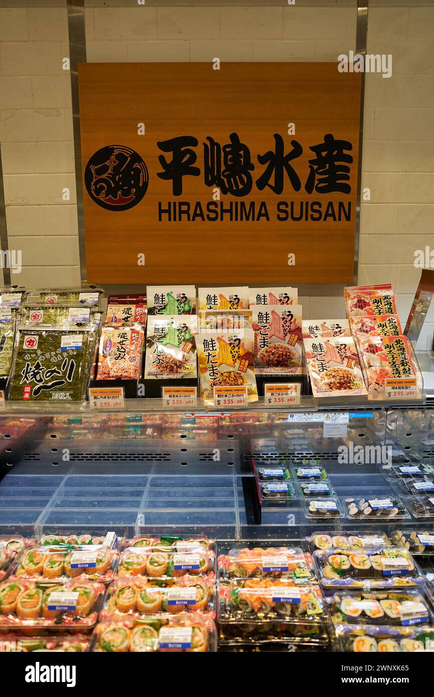 SINGAPORE - NOVEMBER 06, 2023: various sushi displayed at Isetan supermarket in Singapore. Stock Photo