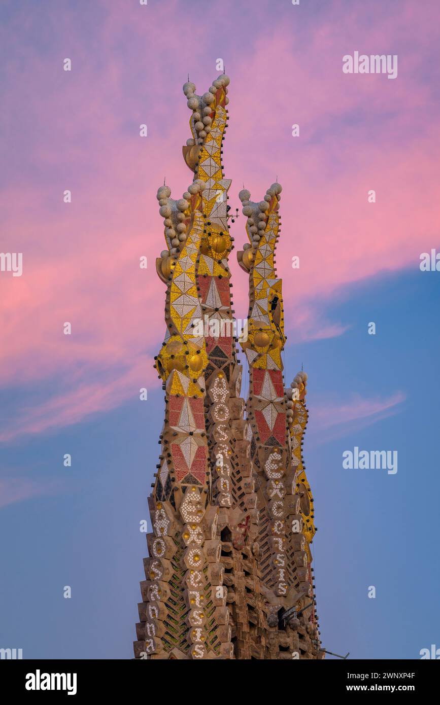 Towers of the Nativity facade of the Sagrada Família at sunset (Barcelona, Catalonia, Spain) ESP: Torres de la fachada del Nacimiento Sagrada Familia Stock Photo