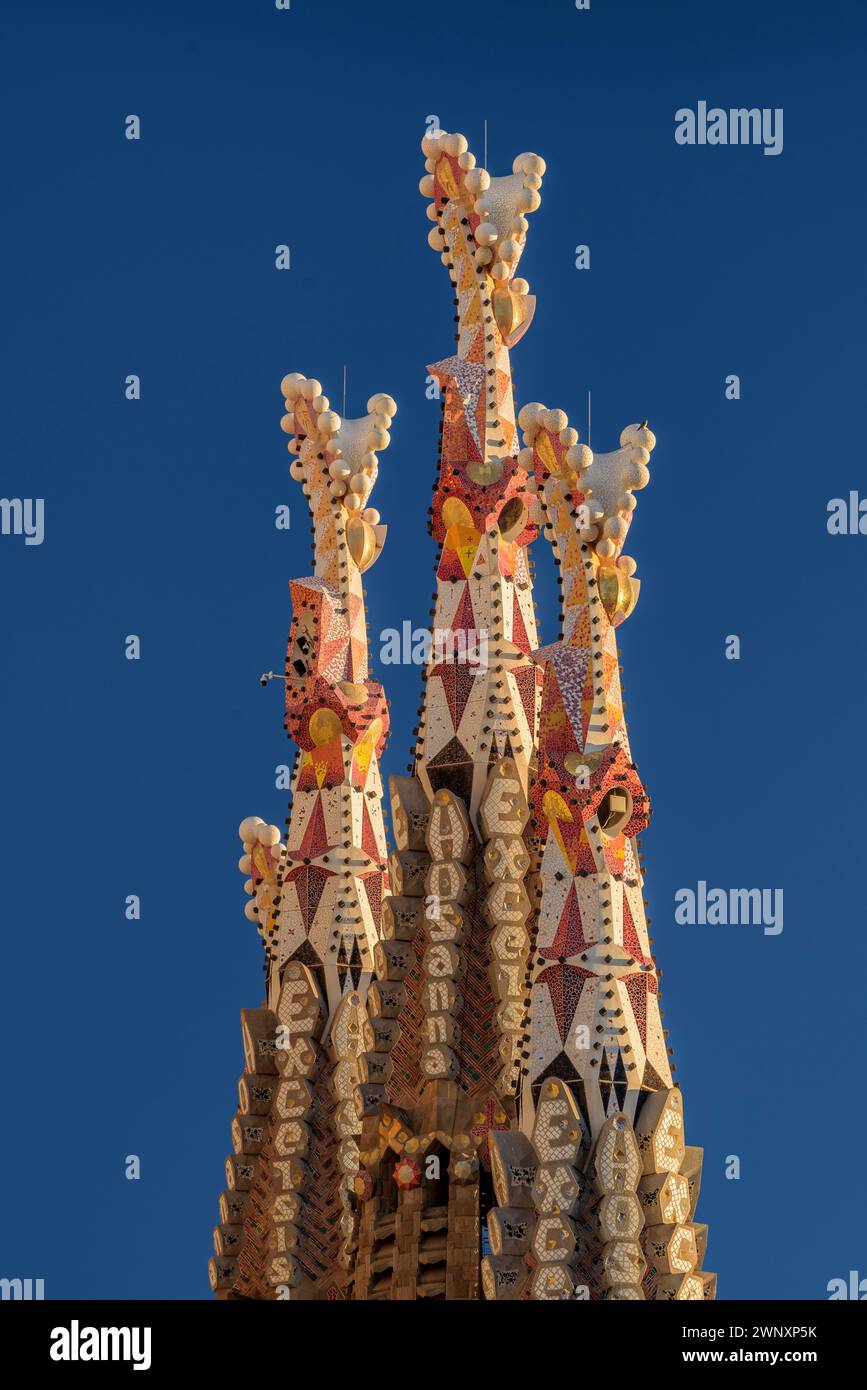 Towers of the Passion facade of the Sagrada Família at sunset (Barcelona, Catalonia, Spain) ESP: Torres de la fachada de la Pasión Sagrada Familia Stock Photo
