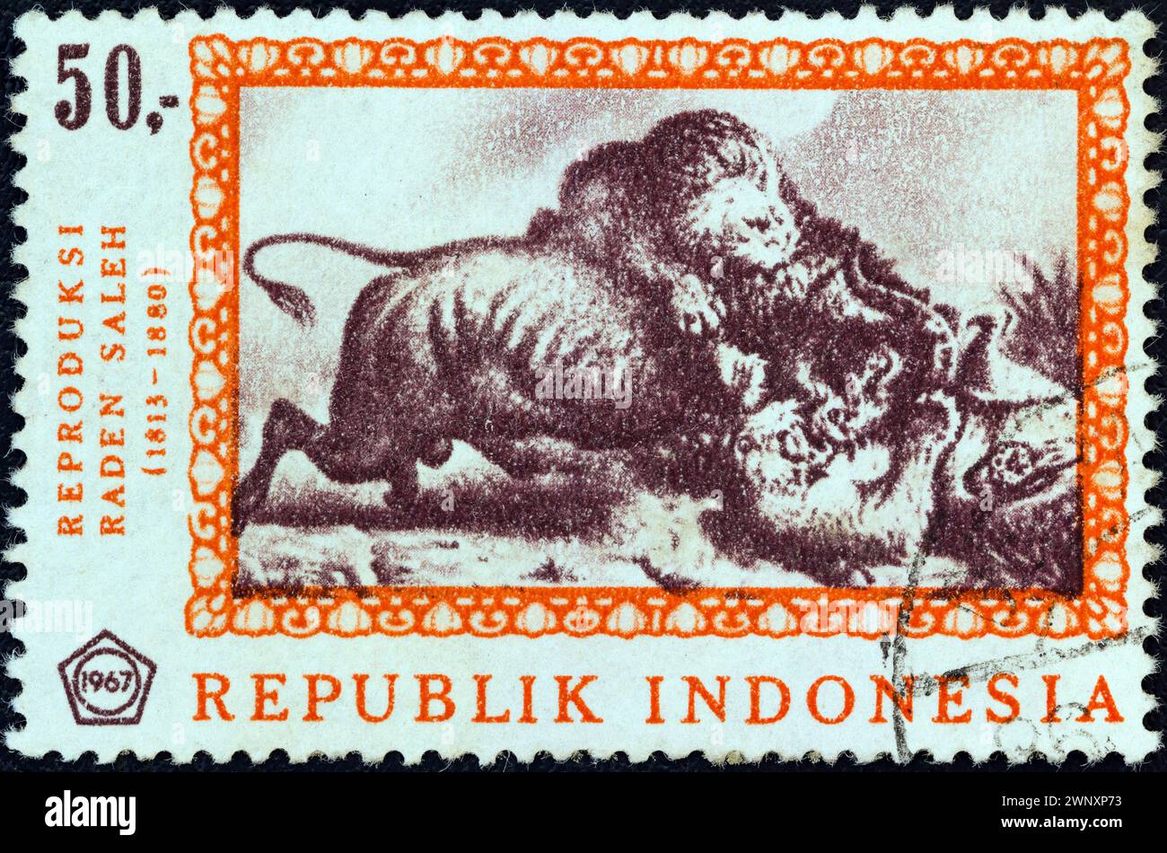 INDONESIA - CIRCA 1967: A stamp printed in Indonesia from the 'Paintings by Raden Saleh' issue shows 'A Fight to the Death' Stock Photo