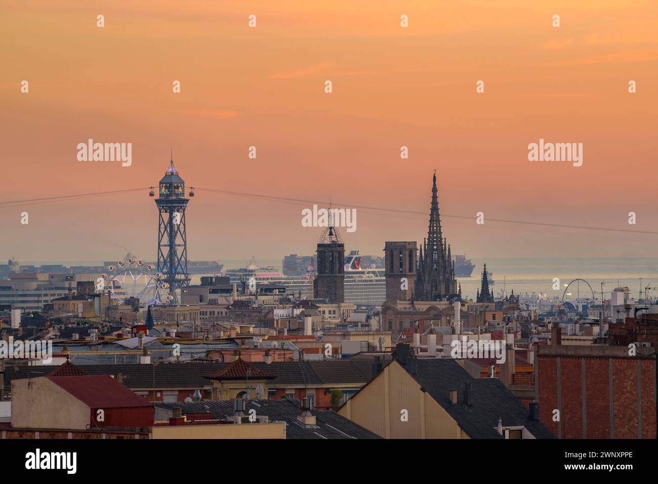 Skyline of the towers of Barcelona Cathedral and the Jaume I tower at sunset (Barcelona, Catalonia, Spain) ESP: Skyline de las torres de la catedral Stock Photo