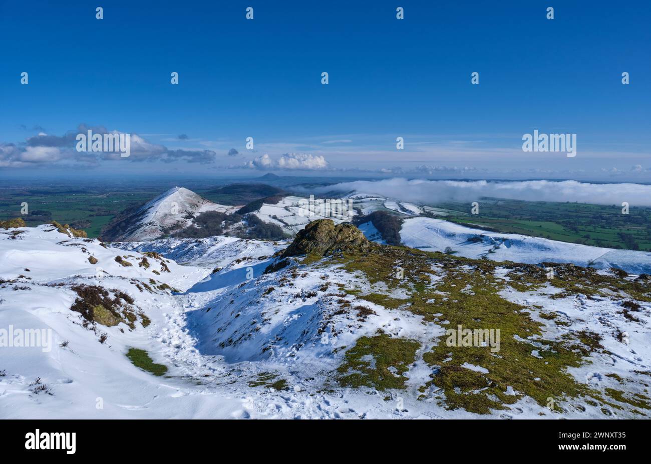 Snow on The Lawley, Hoar Edge, and Yell Bank, seen from a snowy Caer Caradoc, Church Stretton, Shropshire Stock Photo