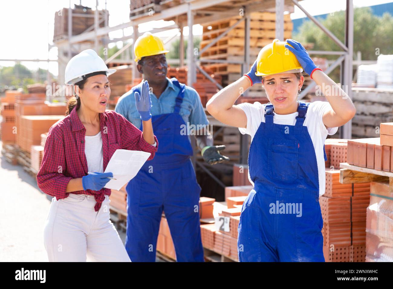 Workers have problems at work at a hardware store Stock Photo