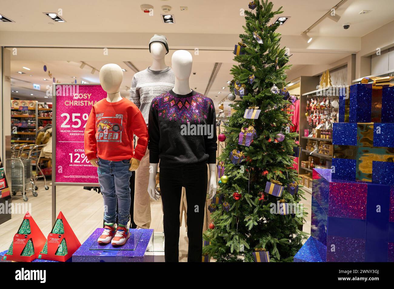 HONG KONG, CHINA - DECEMBER 04, 2023: dressed mannequins displayed at Marks and Spencer store in New Town Plaza shopping mall. Stock Photo