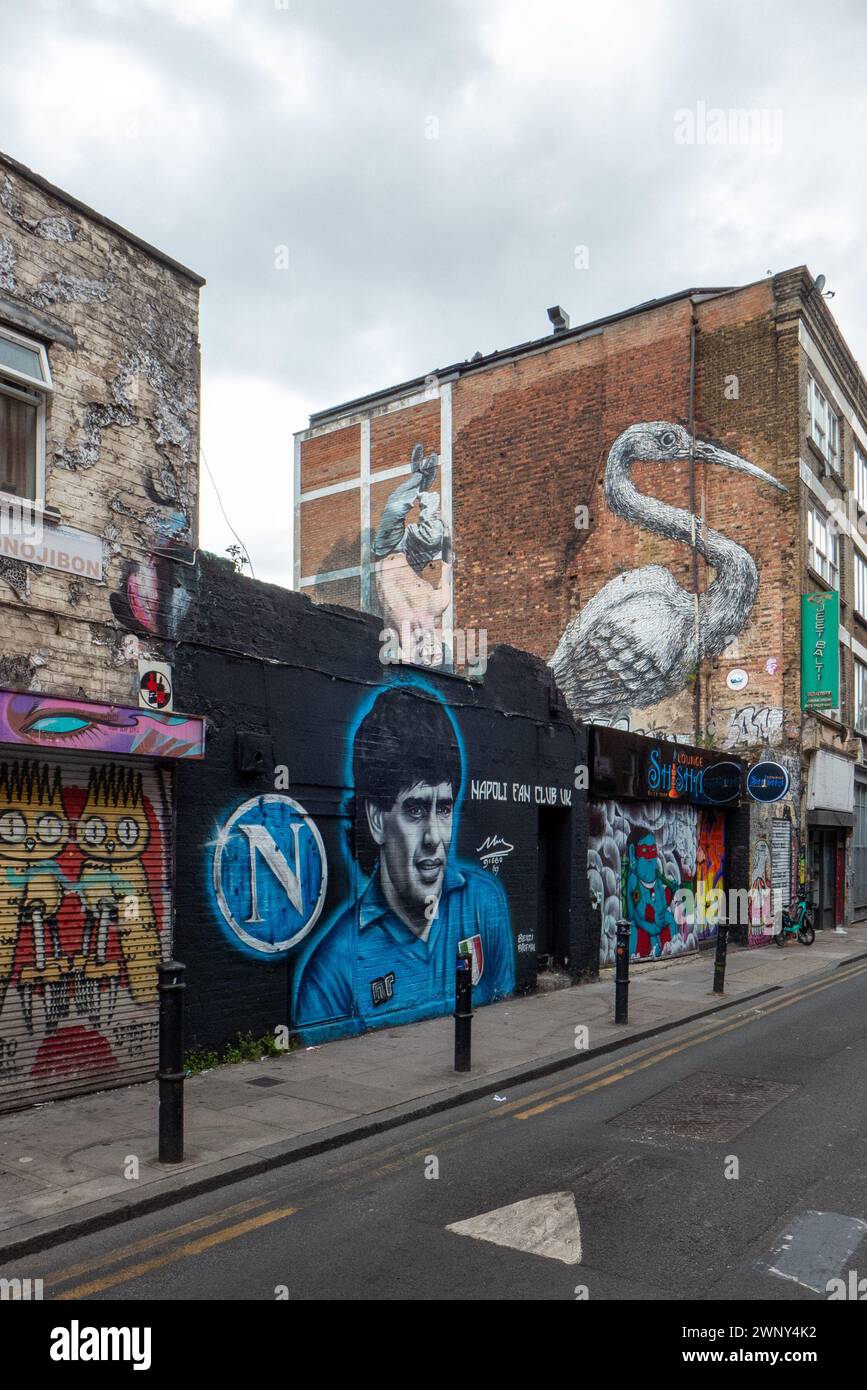 A grafitti on a house in the Brick Lane neighbourhood of London's East End celebrating Maradonna, one of the greatest footballers of all times Stock Photo