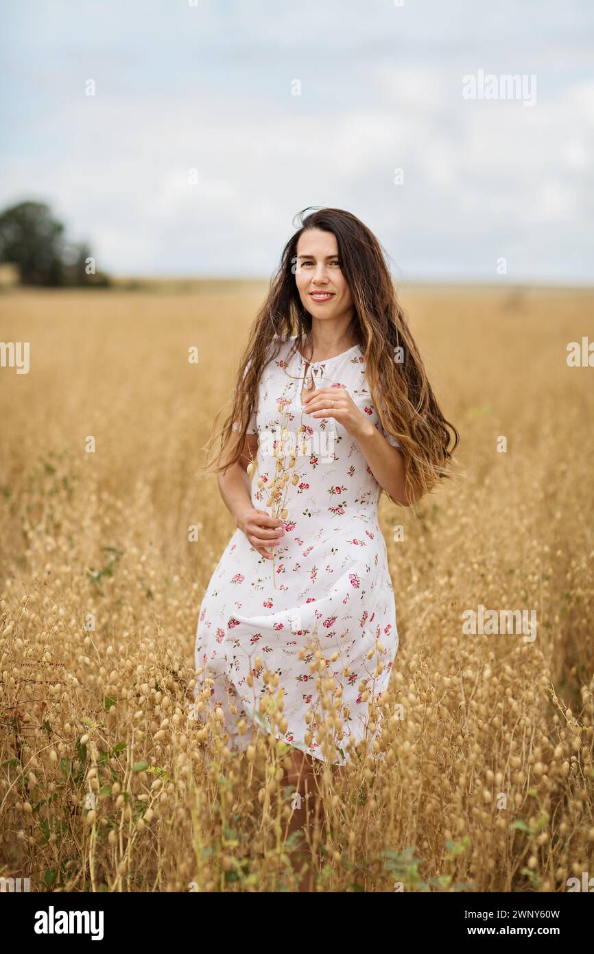 White midi dress hi-res stock photography and images - Alamy