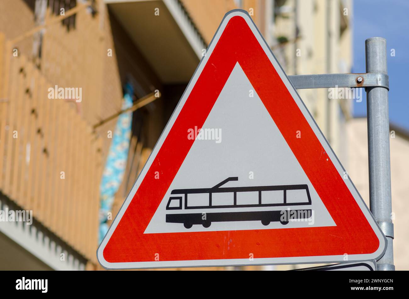 public transport tram, road signs, triangle, indicates medium passage such as light rail or tram, electrified on line with track, pay attention. Stock Photo