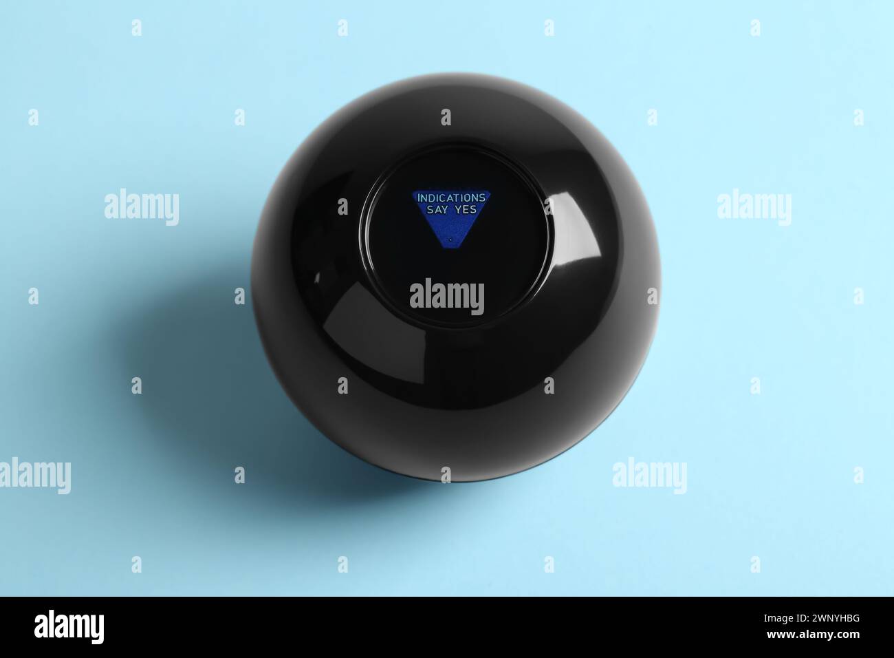 Magic eight ball with prediction Indications Say Yes on light blue ...