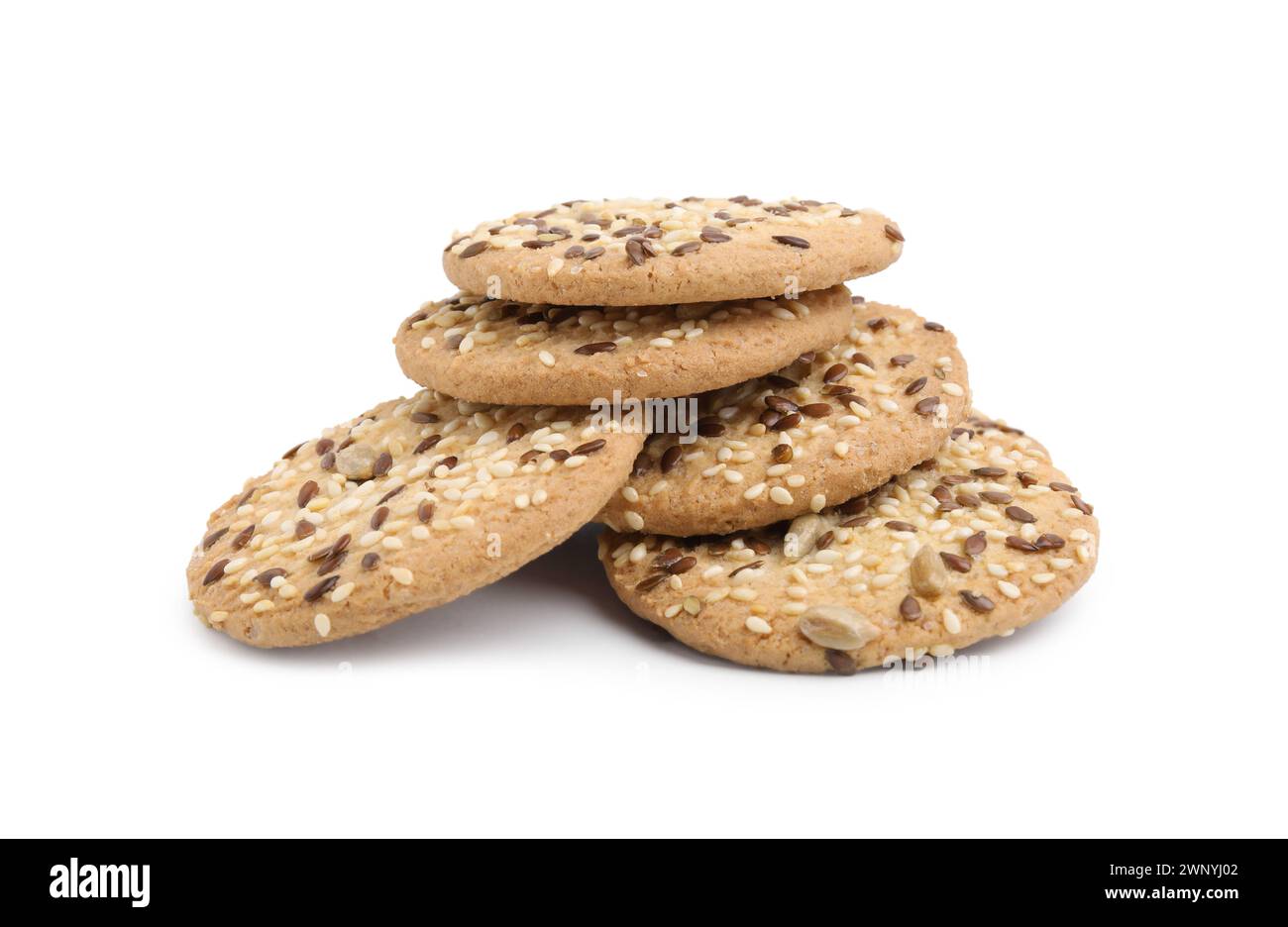 Round cereal crackers with flax, sunflower and sesame seeds isolated on ...