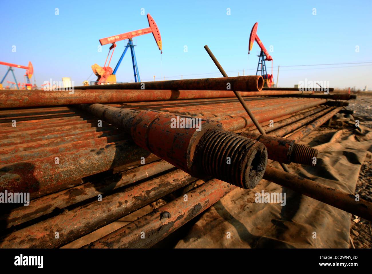 Oil Pipe Stack Oil drill pipe Stock Photo - Alamy