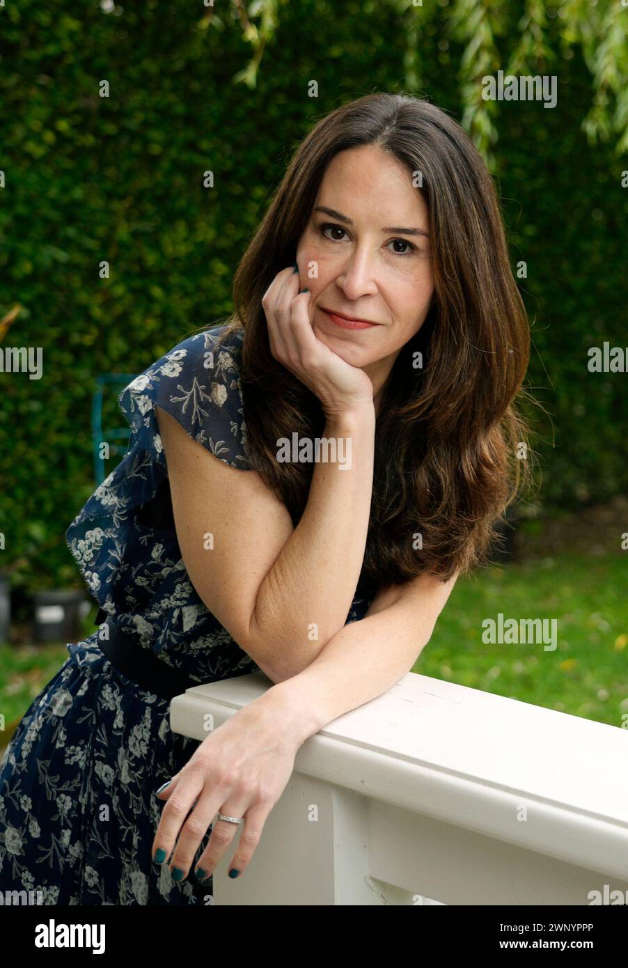 Author Allison Winn Scotch poses for a portrait in her home office