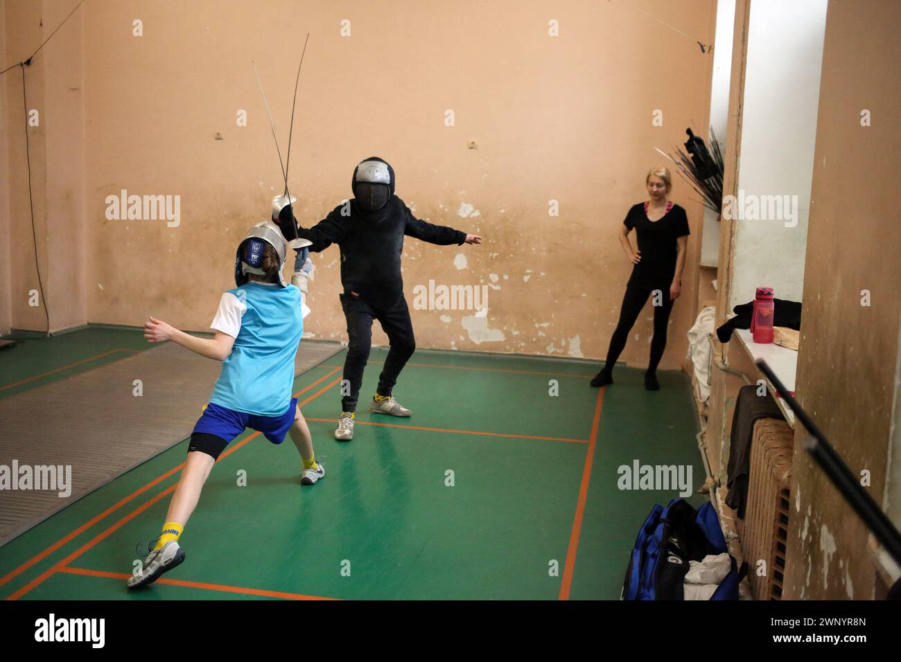 Odessa Ukraine 02nd Mar 2024 A Young Fencer in Blue Practices odessa-ukraine-02nd-mar-2024-a-young-fencer-in-blue-practices