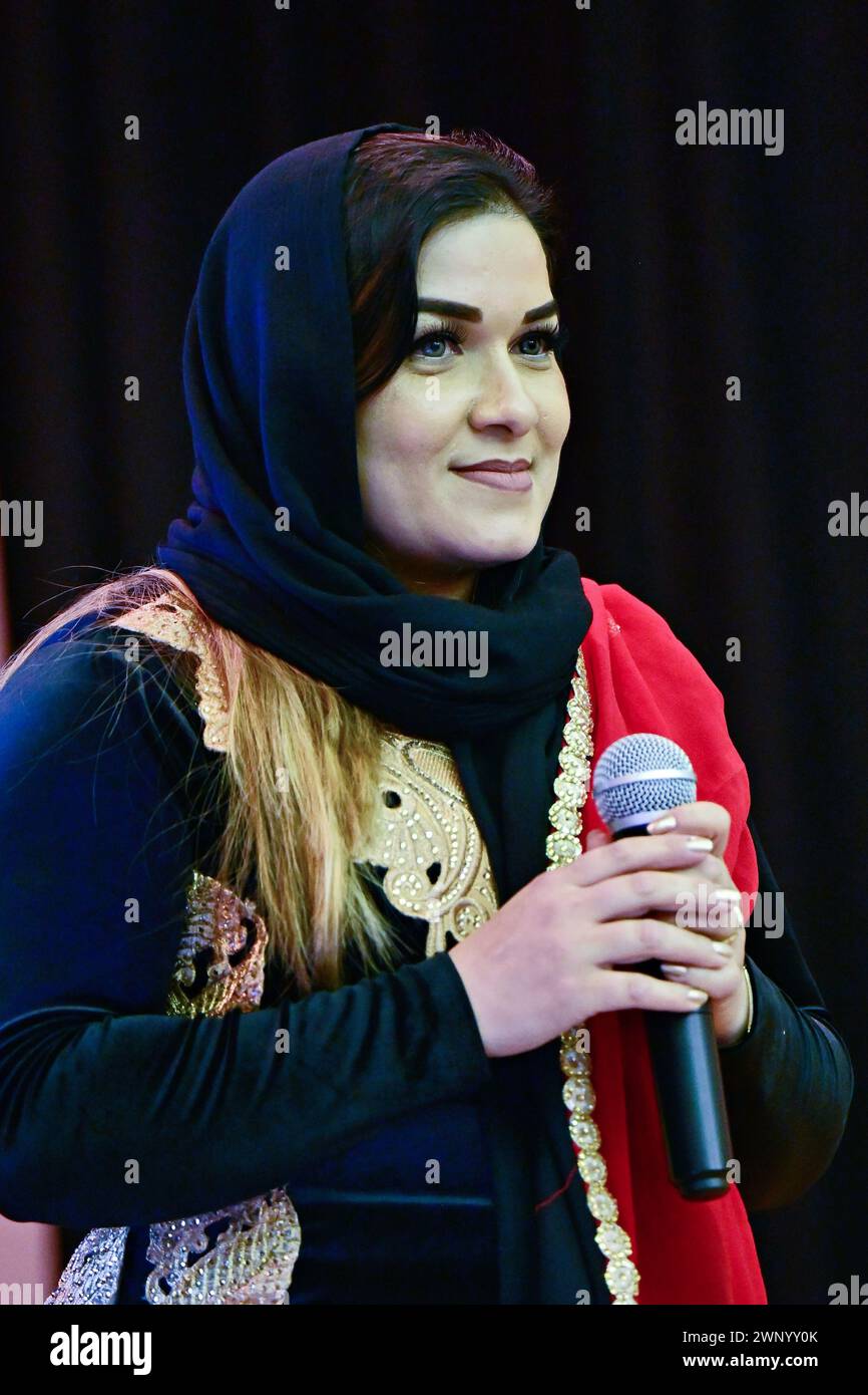 Chiswick Town Hall, London, UK. 4th March 2024: Speaker Yalda Aryan - Coach - Ministry of Education, Iran at The Afghanistan and Central Asian Association (ACAA) is hosting an International Women's Day 2024 called Women: Identity, Integration, and Inclusion. The focus of this year's International Women's event is on 'Inspiring Inclusion', a cultural event that celebrates the strengths and achievements of migrant women. Credit: See Li/Picture Capital/Alamy Live News Stock Photo