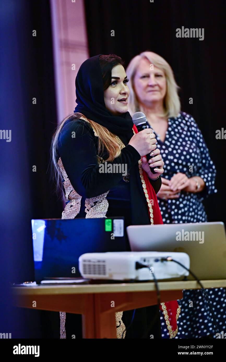 Chiswick Town Hall, London, UK. 4th March 2024: Speaker Yalda Aryan - Coach - Ministry of Education, Iran at The Afghanistan and Central Asian Association (ACAA) is hosting an International Women's Day 2024 called Women: Identity, Integration, and Inclusion. The focus of this year's International Women's event is on 'Inspiring Inclusion', a cultural event that celebrates the strengths and achievements of migrant women. Credit: See Li/Picture Capital/Alamy Live News Stock Photo