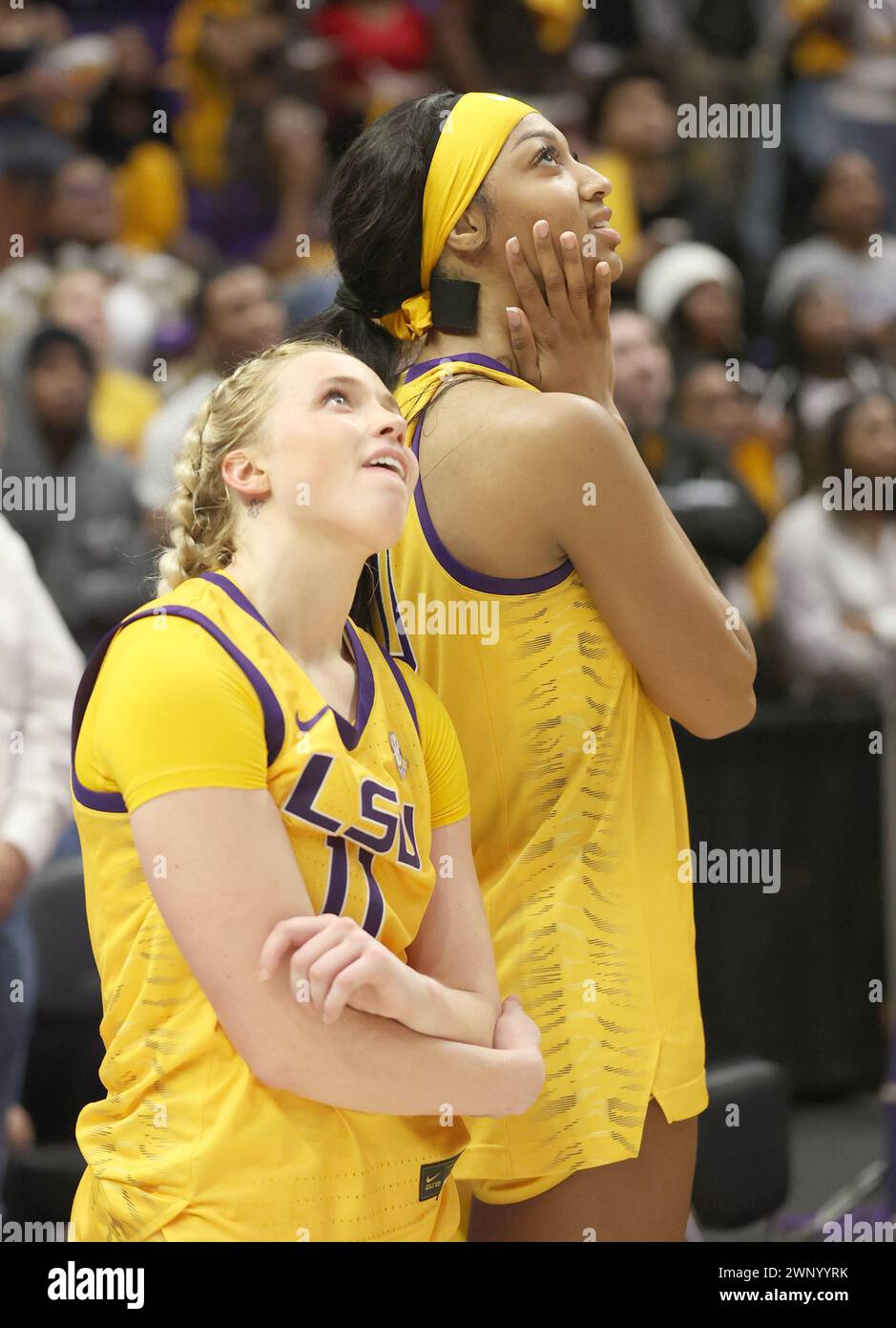 Baton Rouge, USA. 03rd Mar, 2024. LSU Lady Tigers guard Hailey Van Lith (11) and forward Angel Reese (10) both clap during a video tribute video viewing on Senior Night in the conclusion of a Southeastern Conference women's college basketball game at Pete Maravich Assembly Center in Baton Rouge, Louisiana on Sunday, March 3, 2023. Both Van Lith and Reese are featured in the video (Photo by Peter G. Forest/Sipa USA) Credit: Sipa USA/Alamy Live News Stock Photo