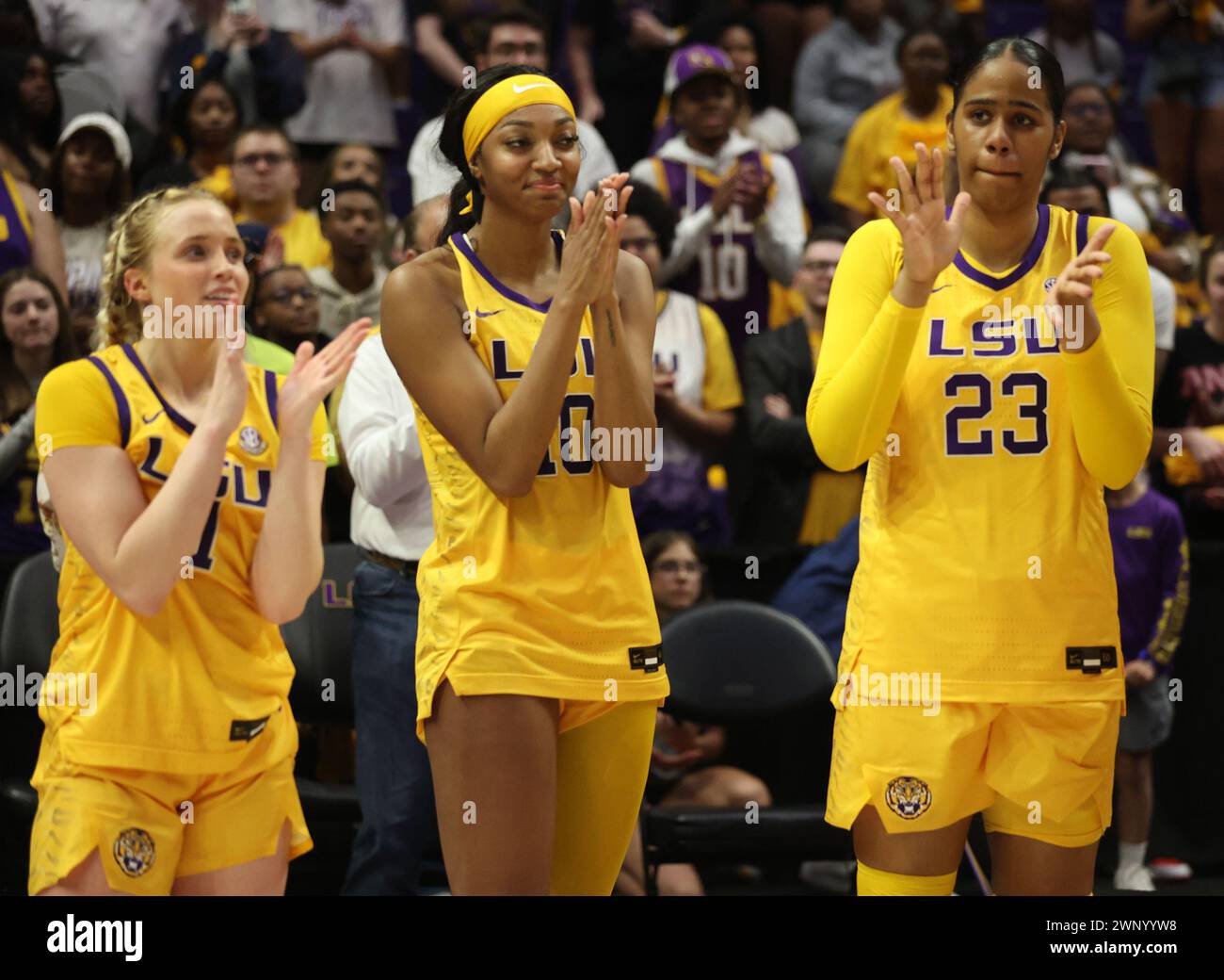 Baton Rouge, USA. 03rd Mar, 2024. LSU Lady Tigers guard Hailey Van Lith (11), forward Angel Reese (10) and center Aalyah Del Rosario (23) all clap during a video tribute video viewing on Senior Night in the conclusion of a Southeastern Conference women's college basketball game at Pete Maravich Assembly Center in Baton Rouge, Louisiana on Sunday, March 3, 2023. Both Van Lith and Reese are featured in the video (Photo by Peter G. Forest/Sipa USA) Credit: Sipa USA/Alamy Live News Stock Photo