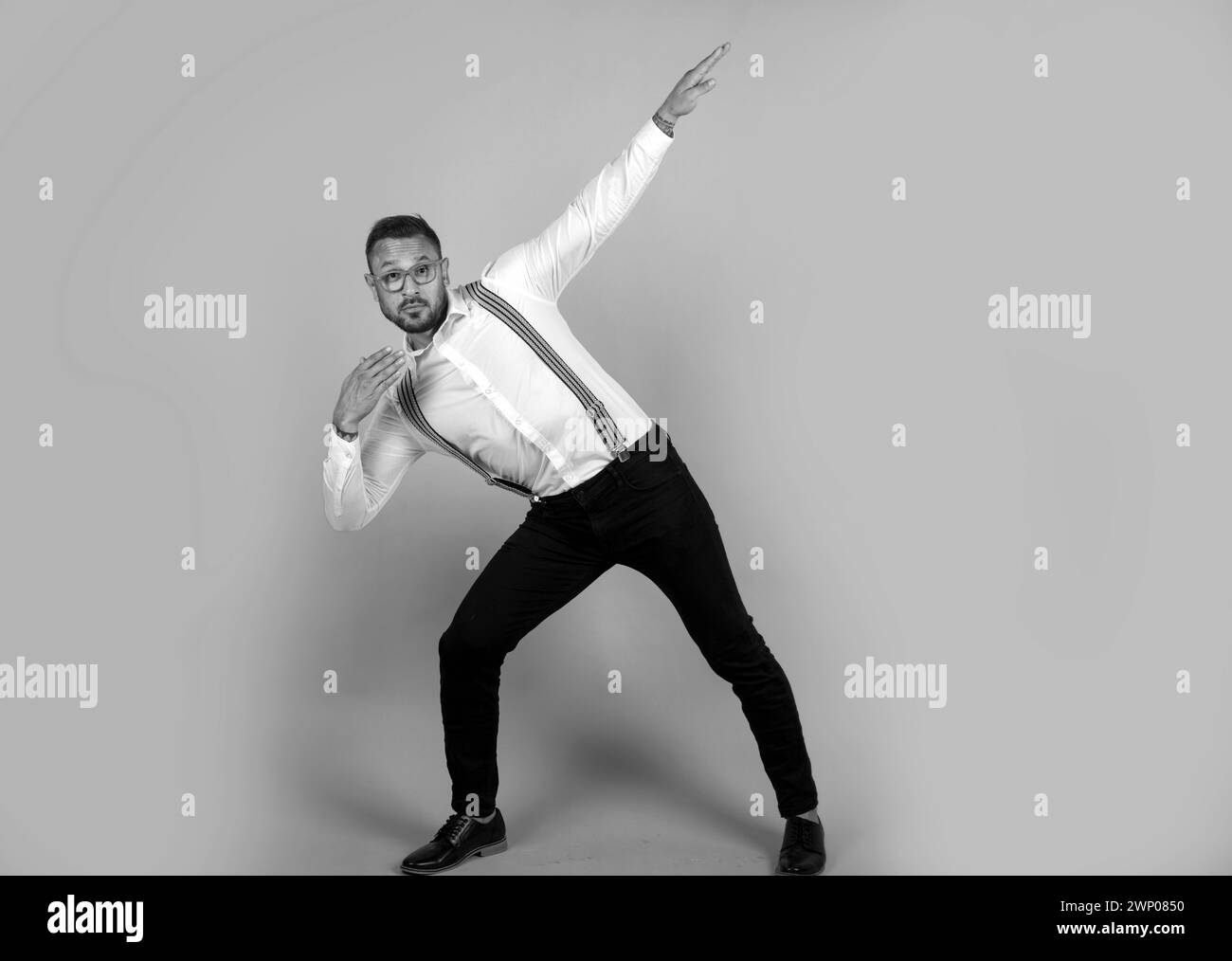 Portrait of funny funky crazy man with win gesture celebrate success. Stock Photo