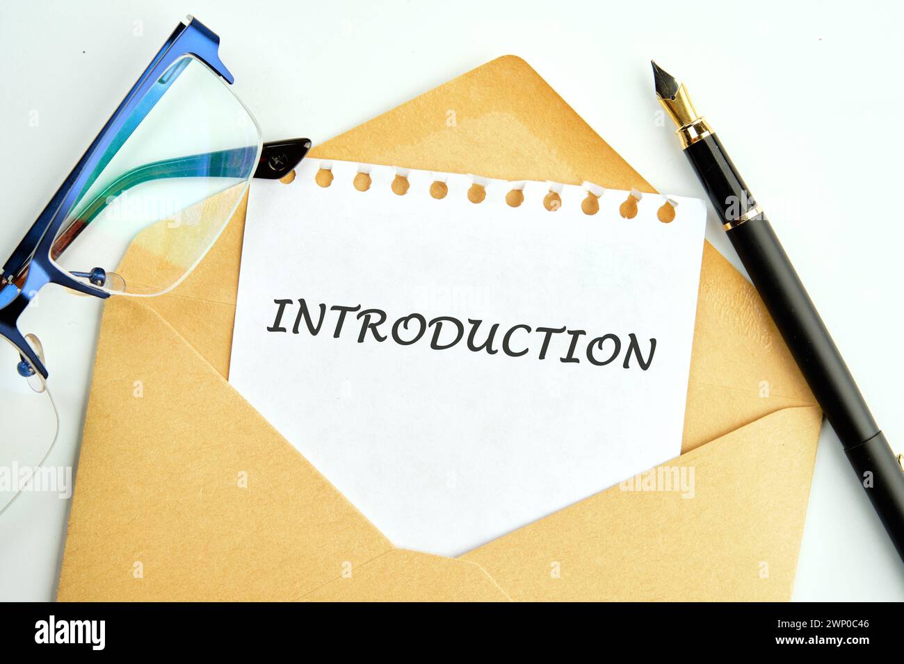 Business concept. Introduction Word written on a sheet in an envelope ...
