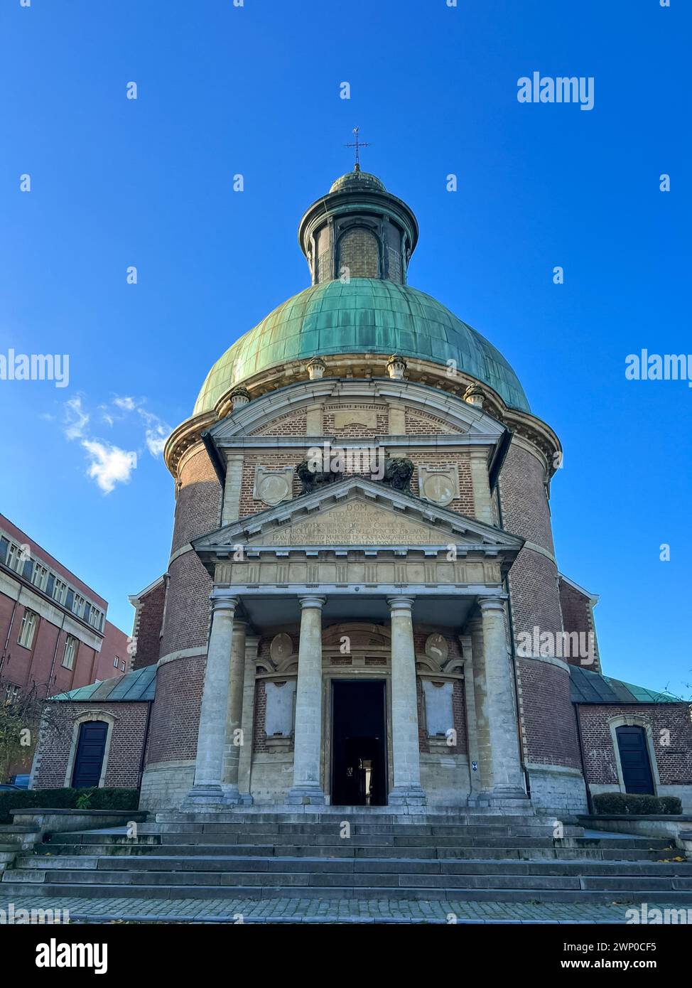 Neoclassical Church with Green Roof, Grand Dome and Ornate Classical Facade Stock Photo